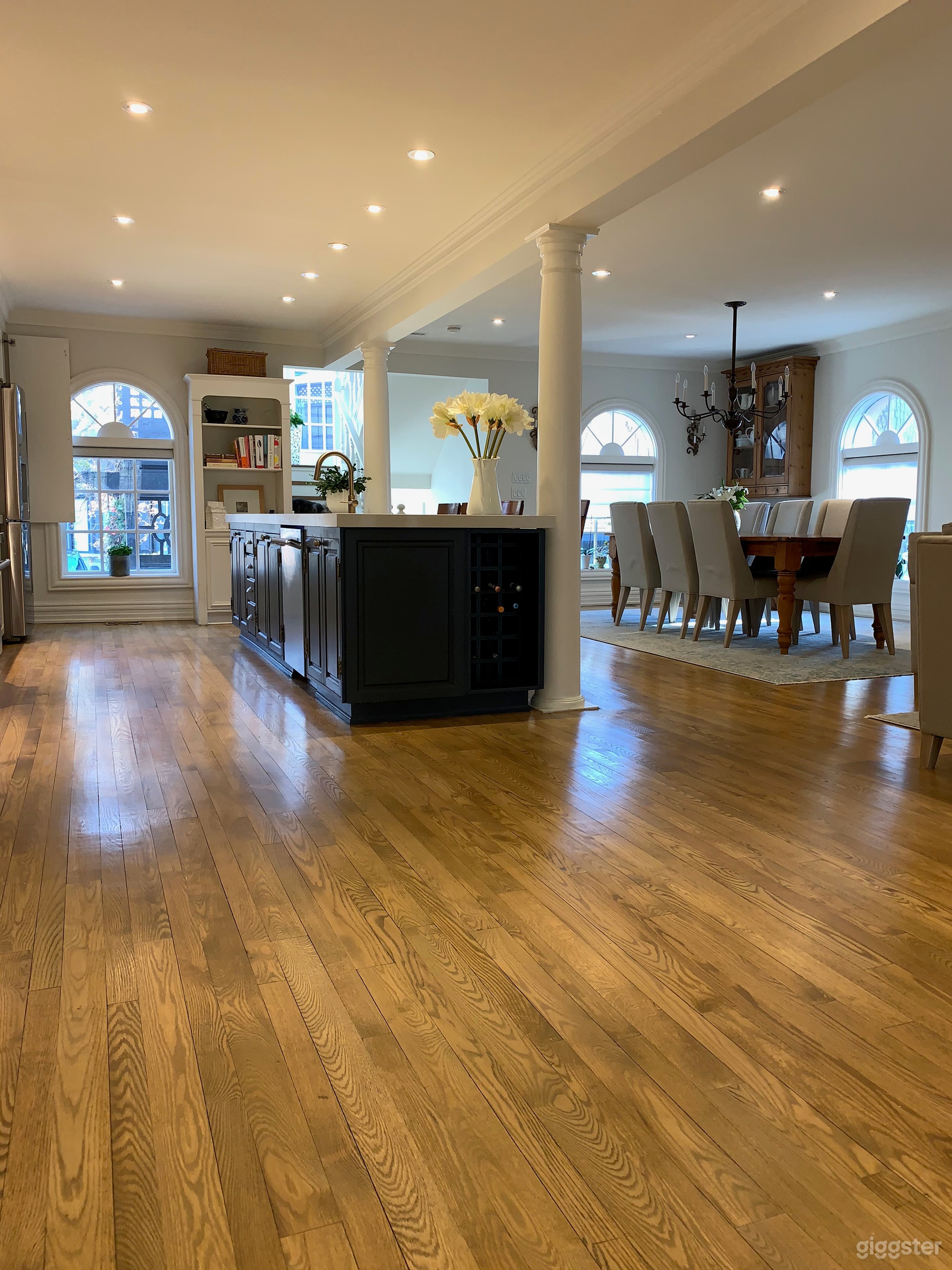 Open floor plan mainfloor with gourmet kitchen, complete with Thermador 6 burner gas oven, dishwasher, side by side refrigerator and 12 ft island accomodates additional seating.