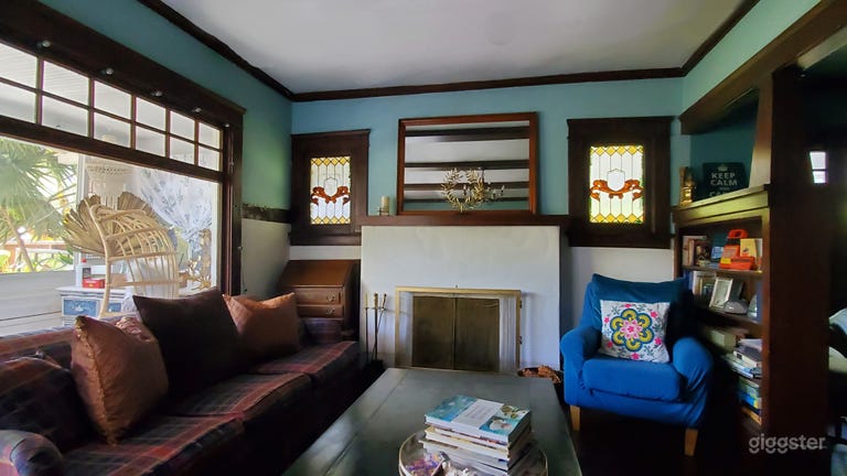  Colorful living room with stained glass and working fireplace  