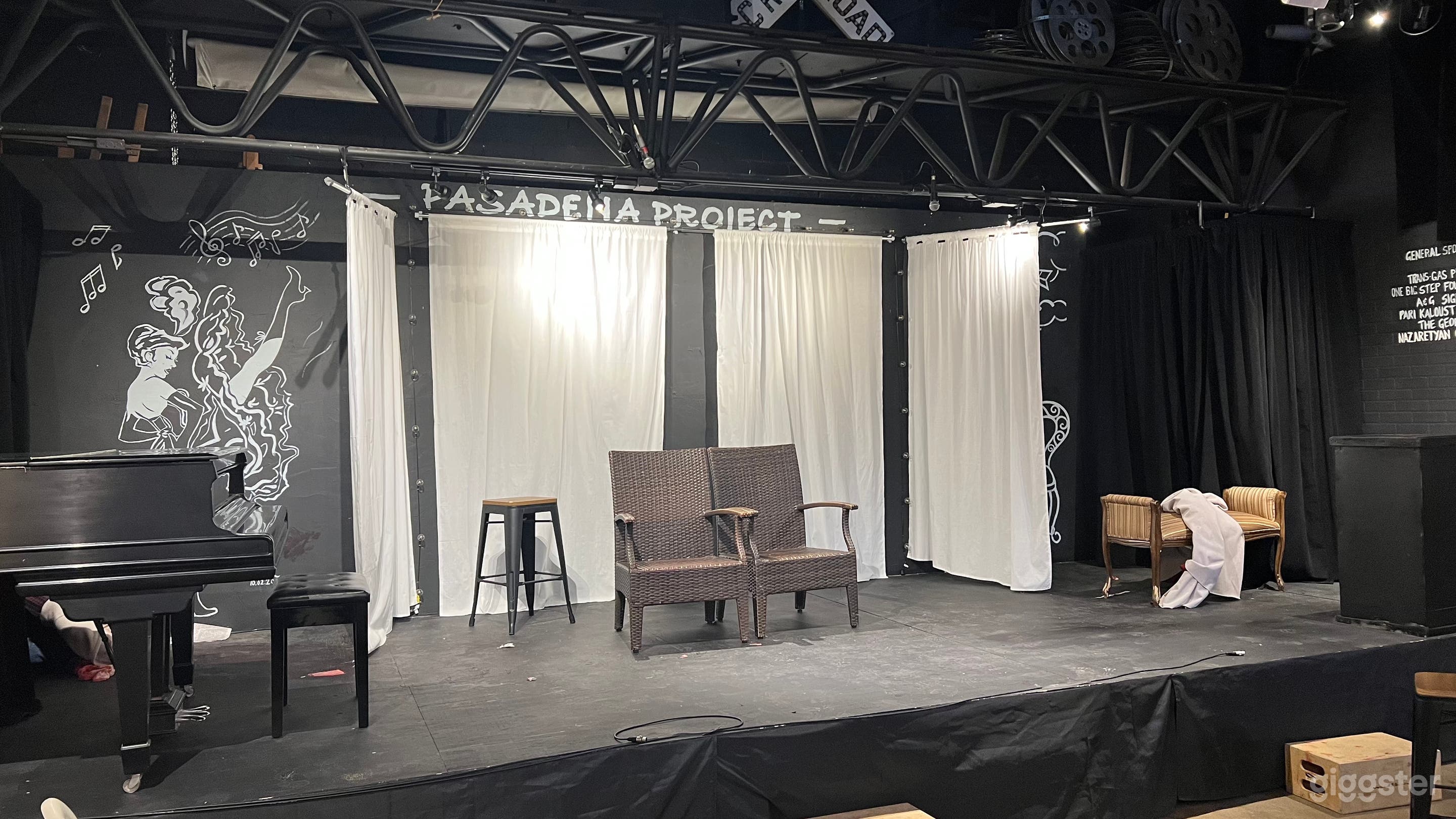 Our Stage which includes specialized lighting and sound systems. The stage is located at the front of the store.