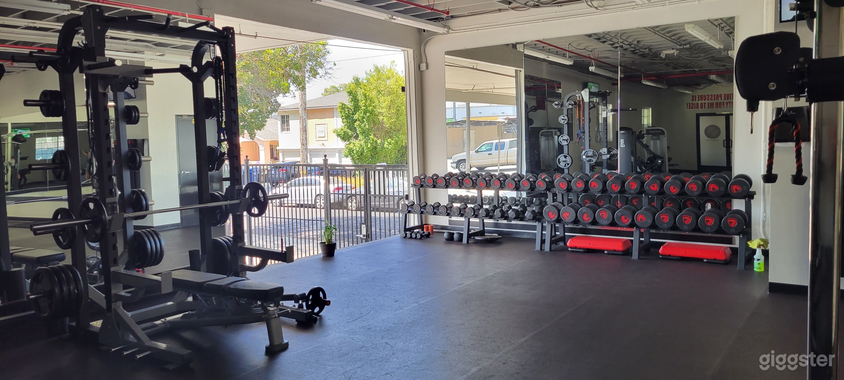 Modern gym industrial setting w/ lots of parking Photo 1