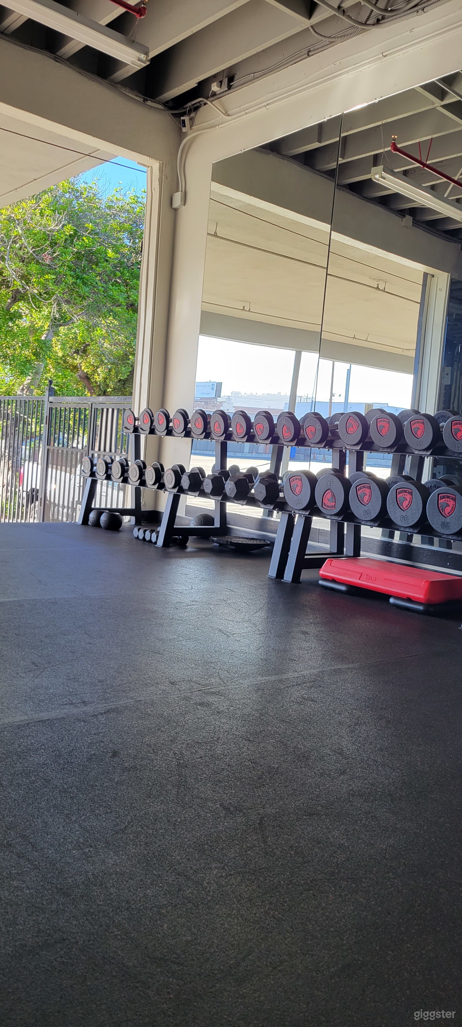 Modern gym industrial setting w/ lots of parking Photo 4