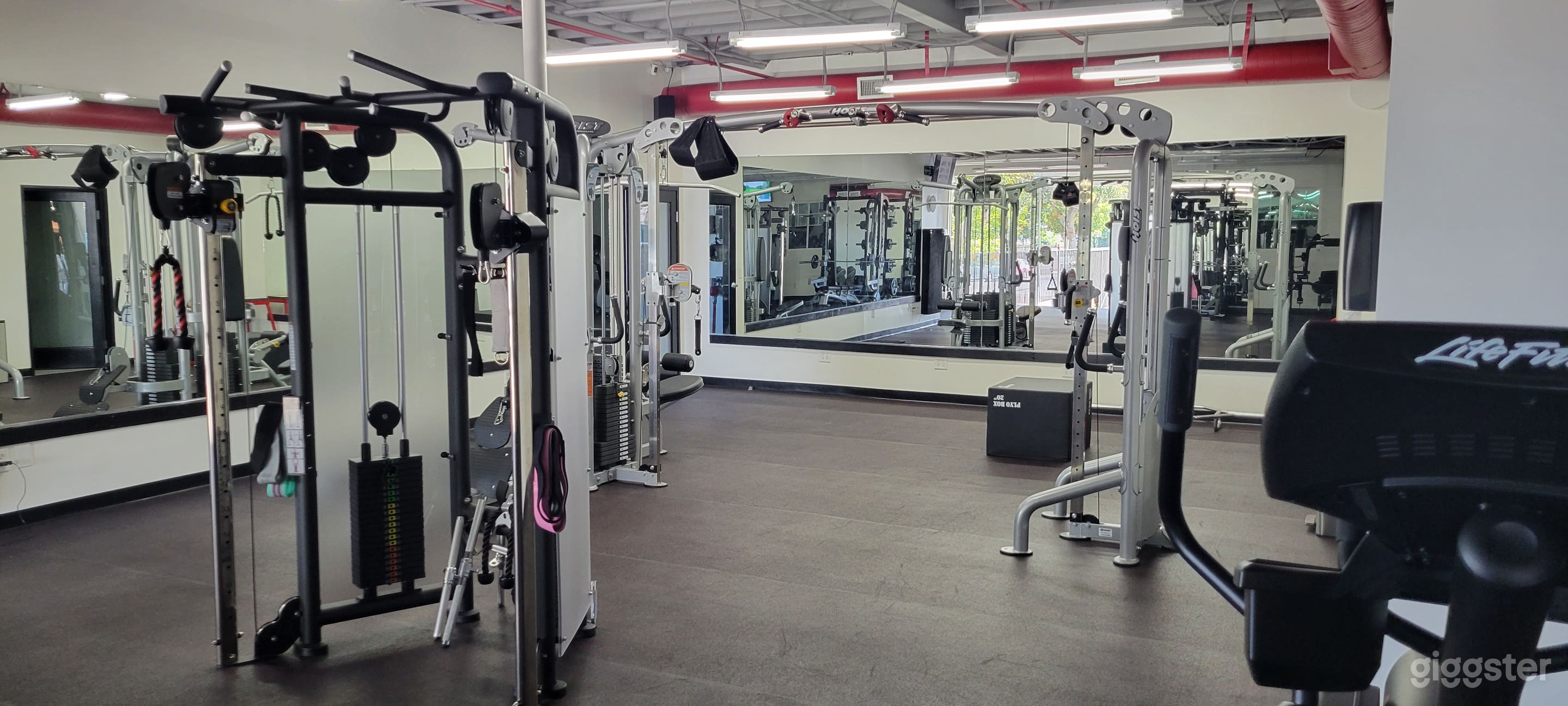 Modern gym industrial setting w/ lots of parking Photo 3