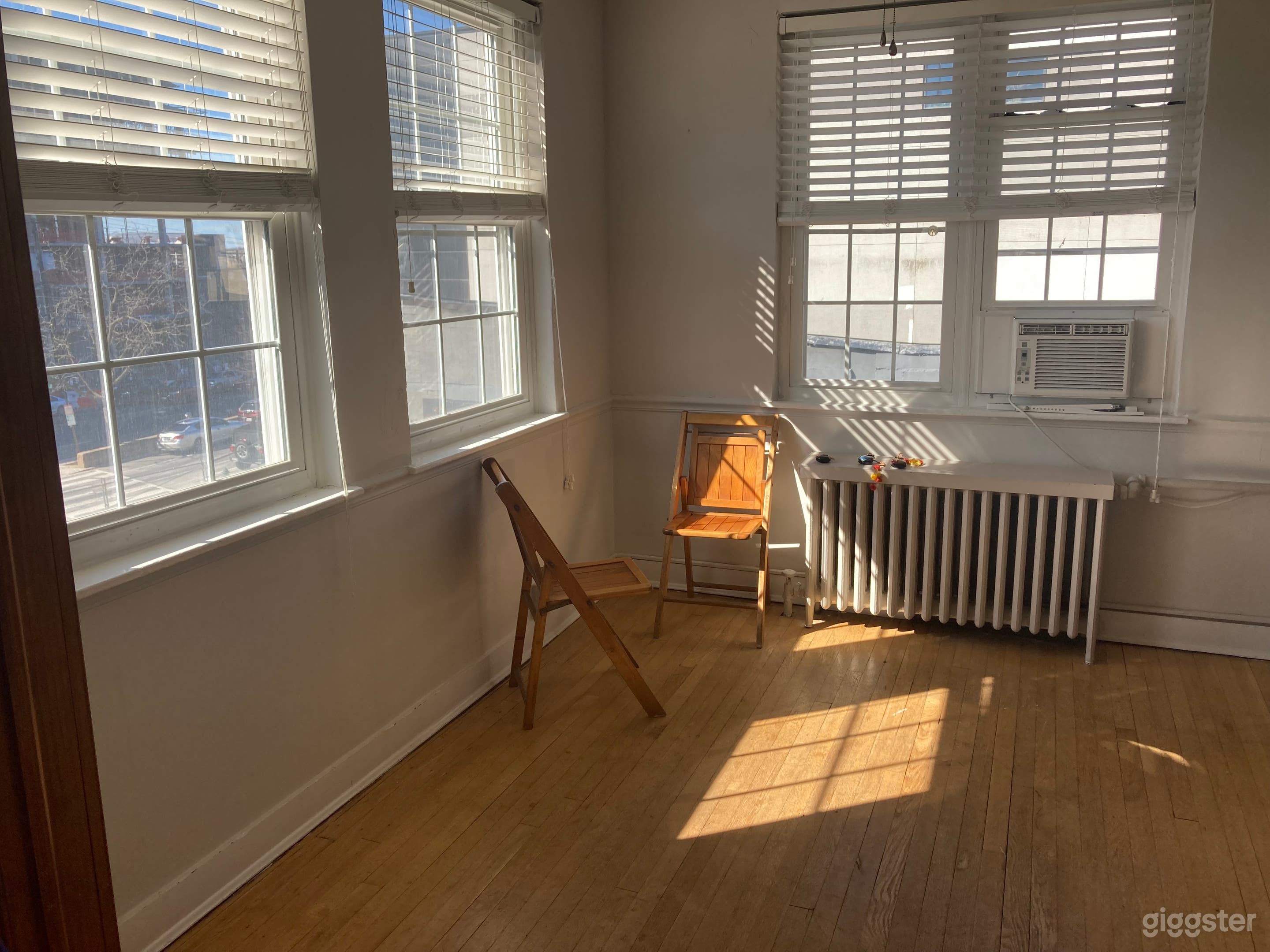 Side room separated by French doors, warm and peaceful vibe.
