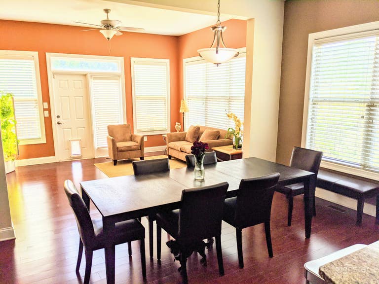  The sunroom is well lit with two full walls of windows 