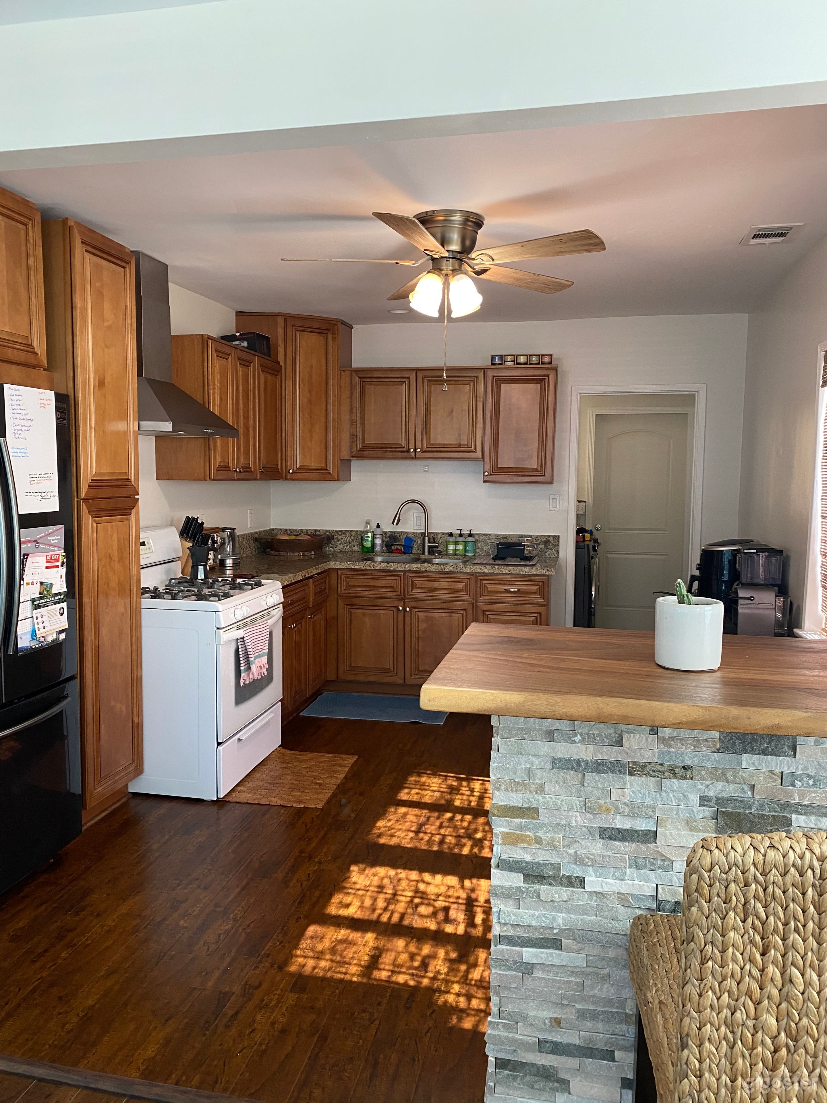 Open kitchen with live edge wood bar