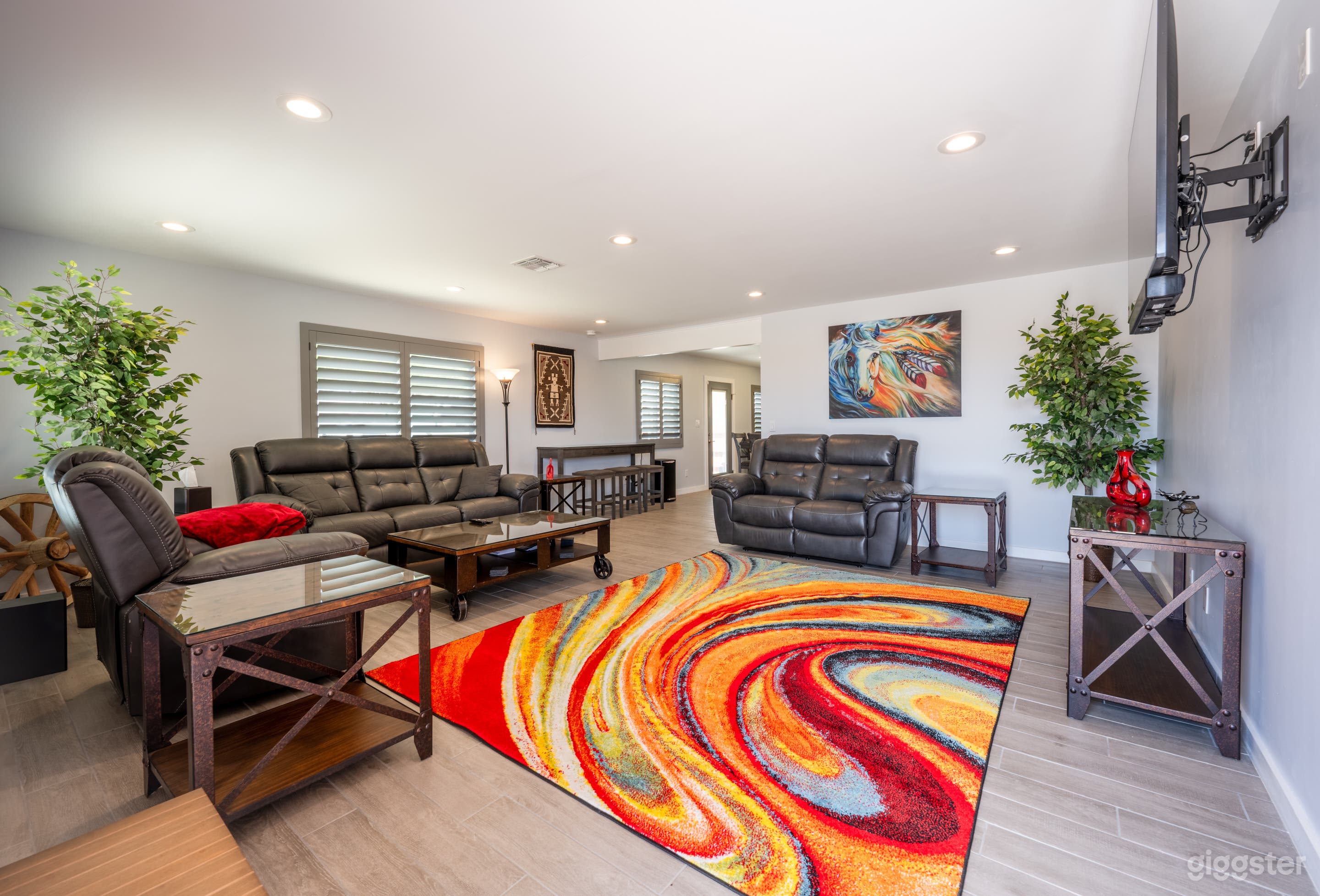 Living room with games and smart TVs in all rooms. 