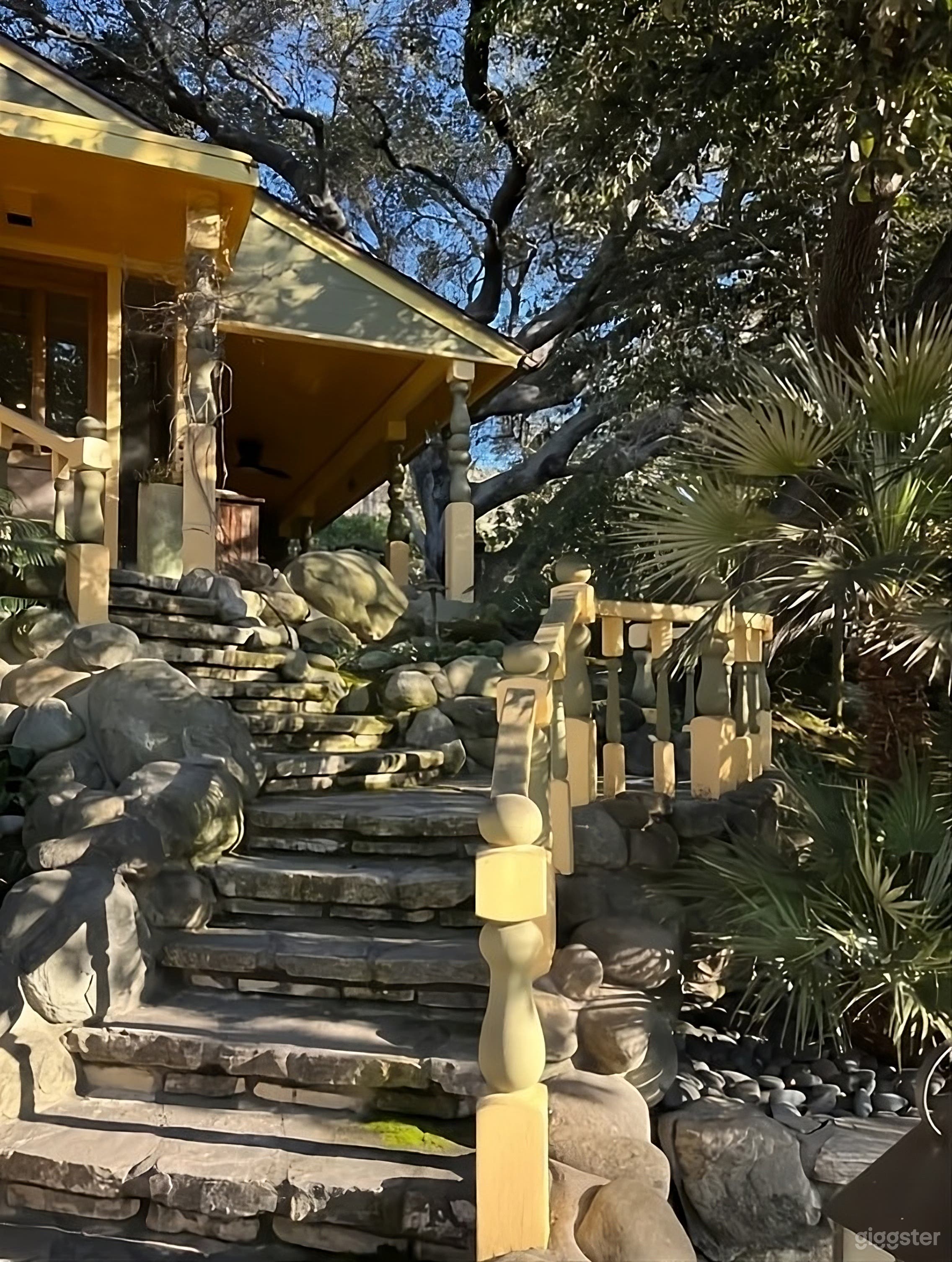 Enchanting Terraced Backyard with Stone Pool Photo 3