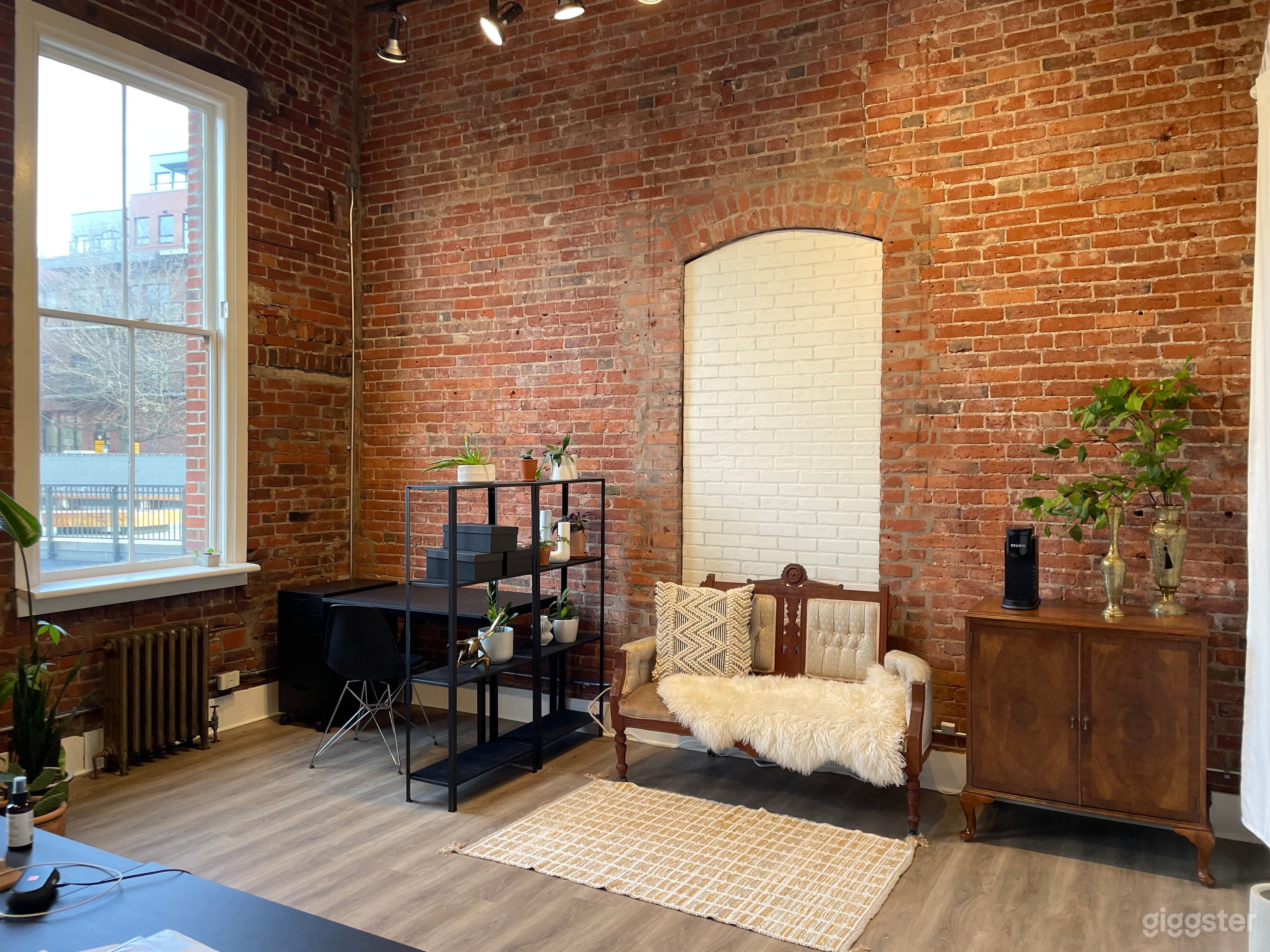Character space in a 1980’s built heritage building. Dripping in charm. 18 foot high ceilings, brick walls, beautiful oversized original sash windows. 