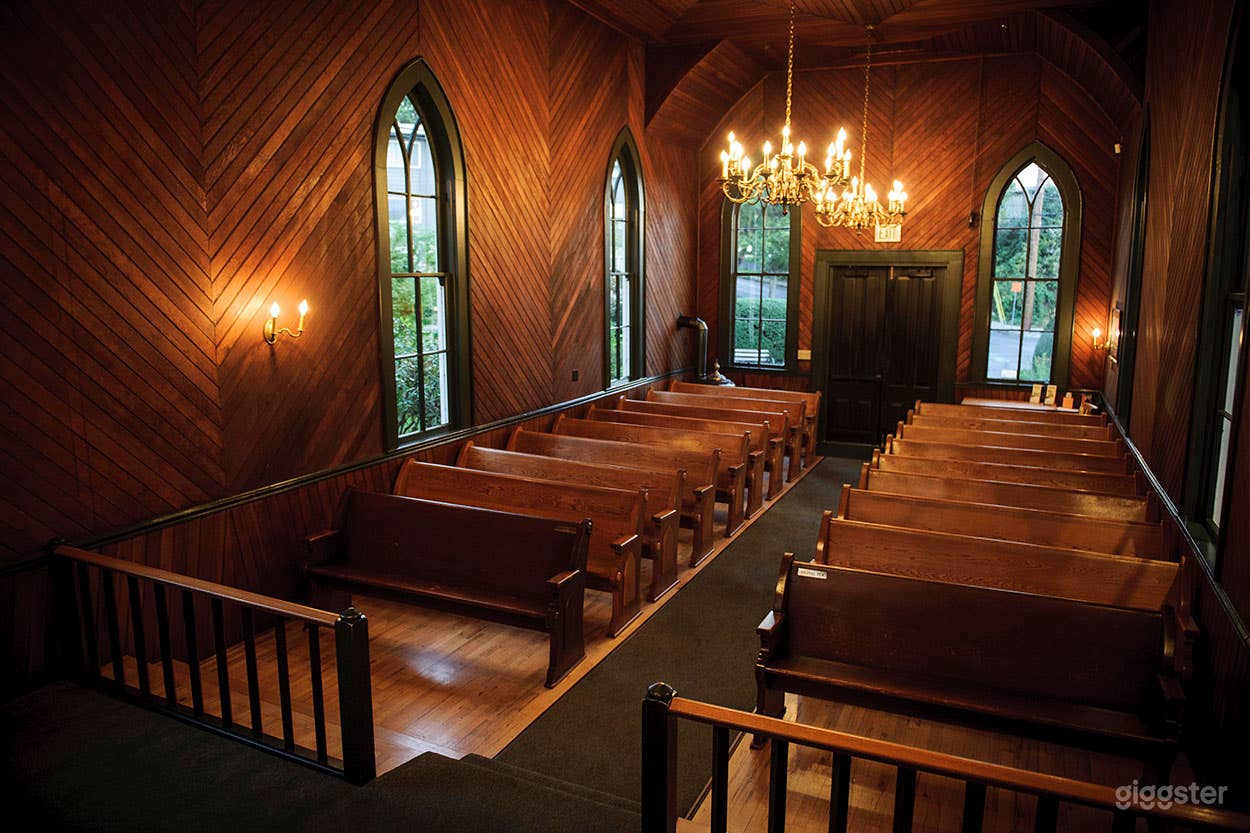Warm interior view from alter towards south main doors.