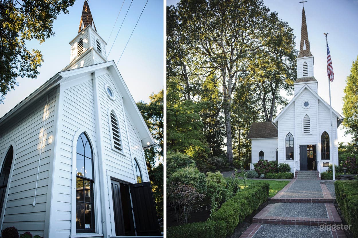 Little white chapel in beautiful gardens.