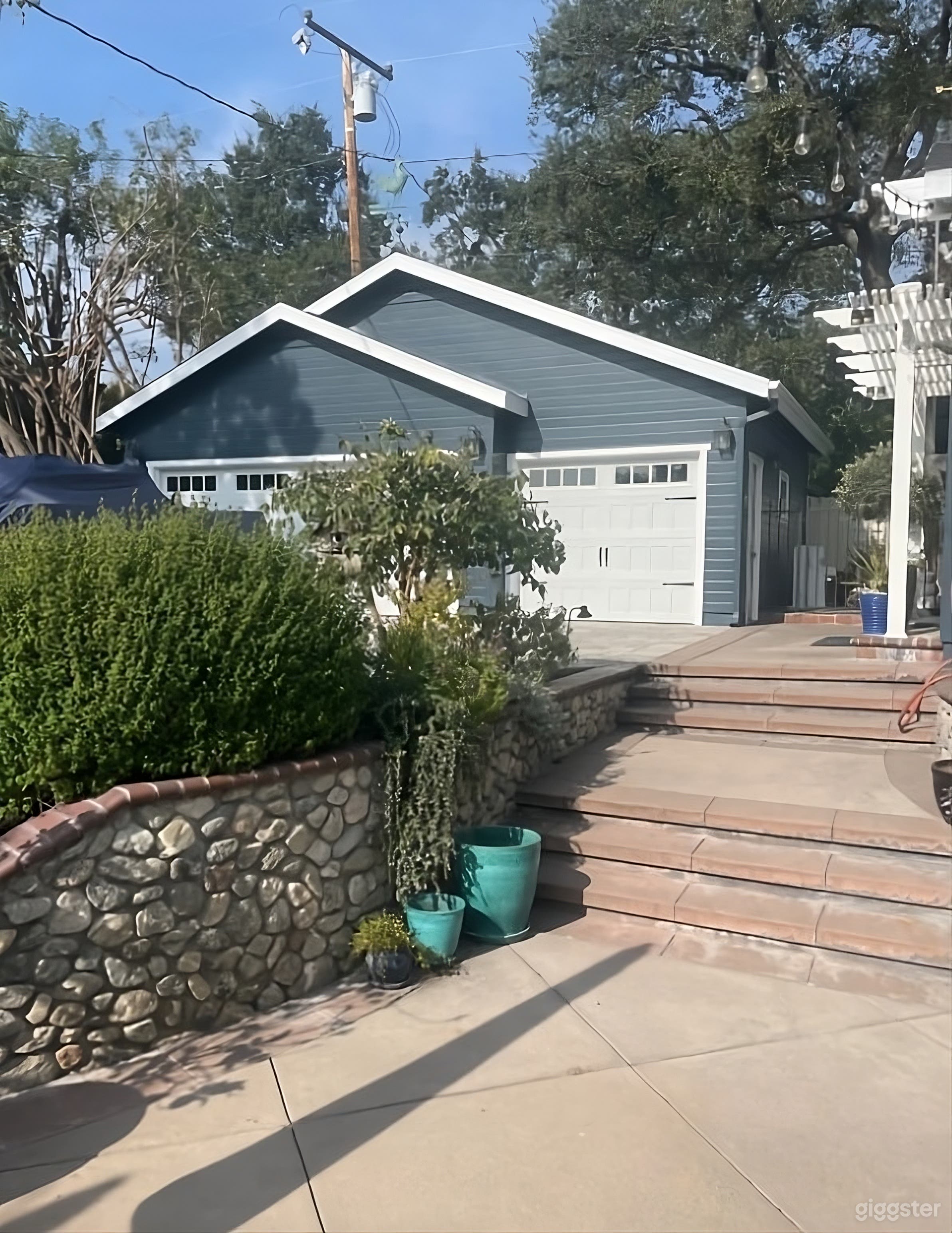 Unique Backyard with Rustic Garden Charm Photo 4