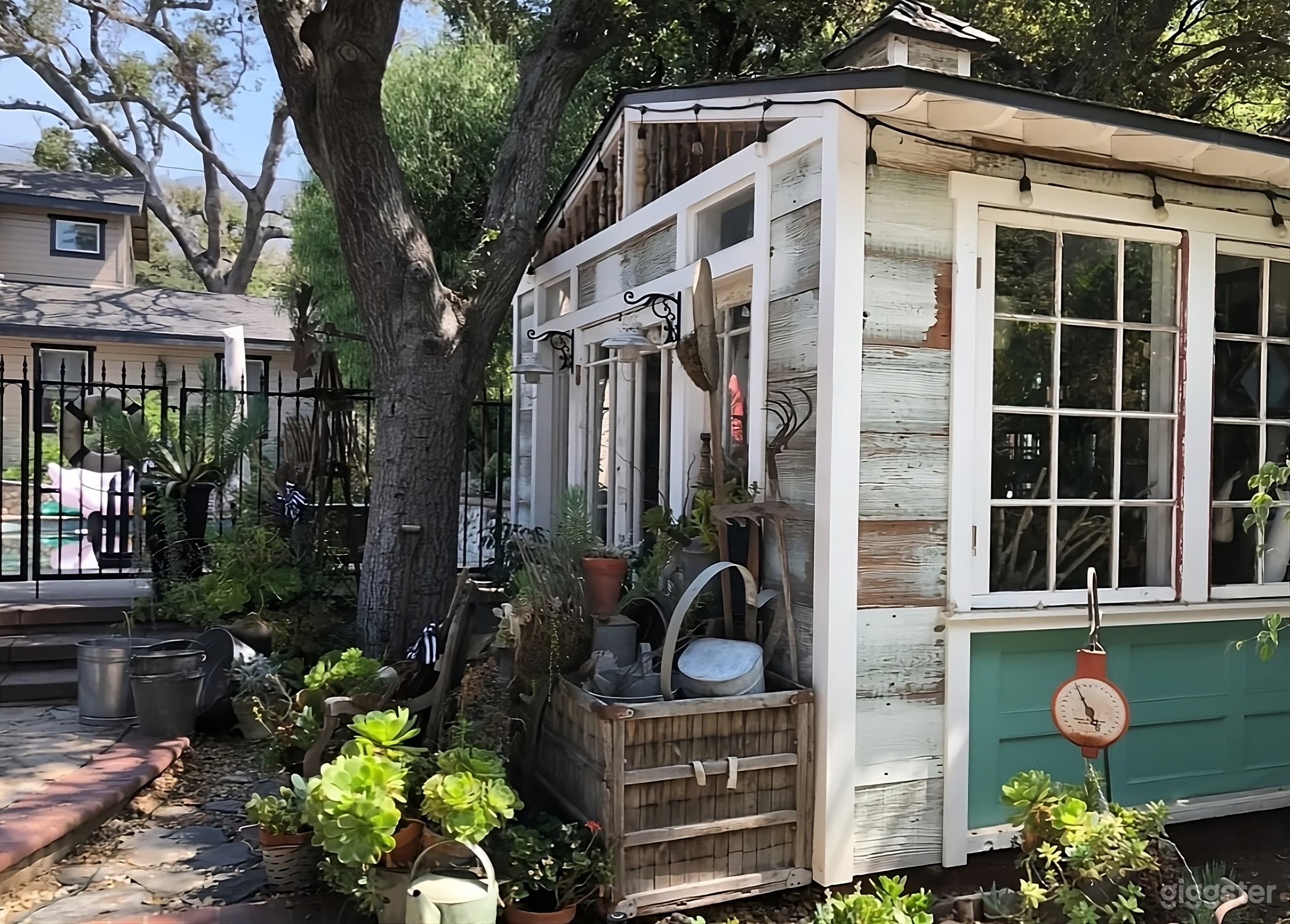 Unique Backyard with Rustic Garden Charm Photo 3