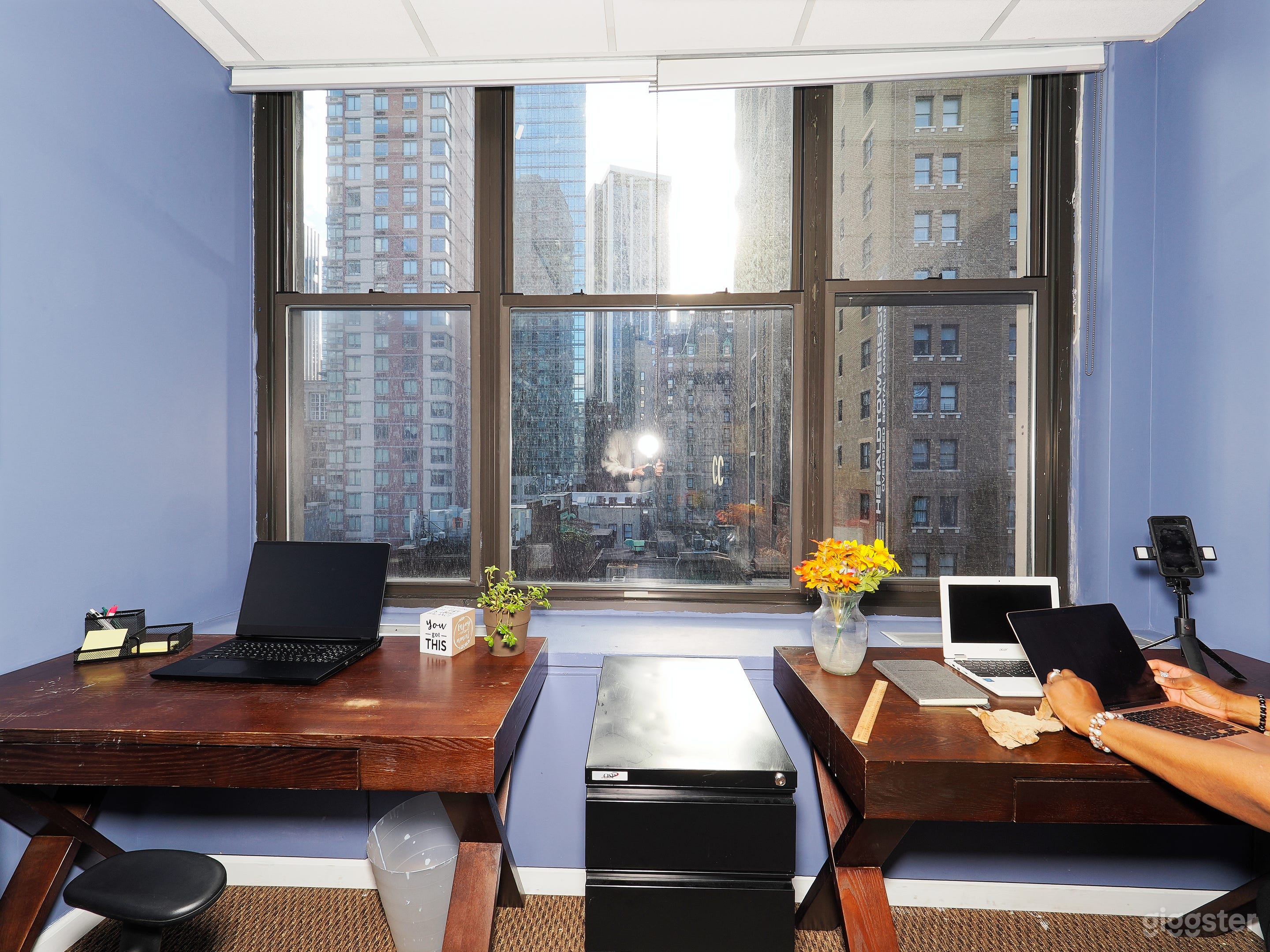 2 Desks with File Cabinet and large window in 500 square foot office.  Let us know what else you need in the office and we can include it for a small fee.