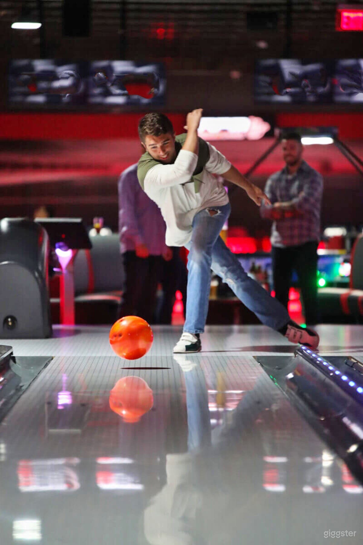 Bowling Lanes with Relaxing Couch Photo 4