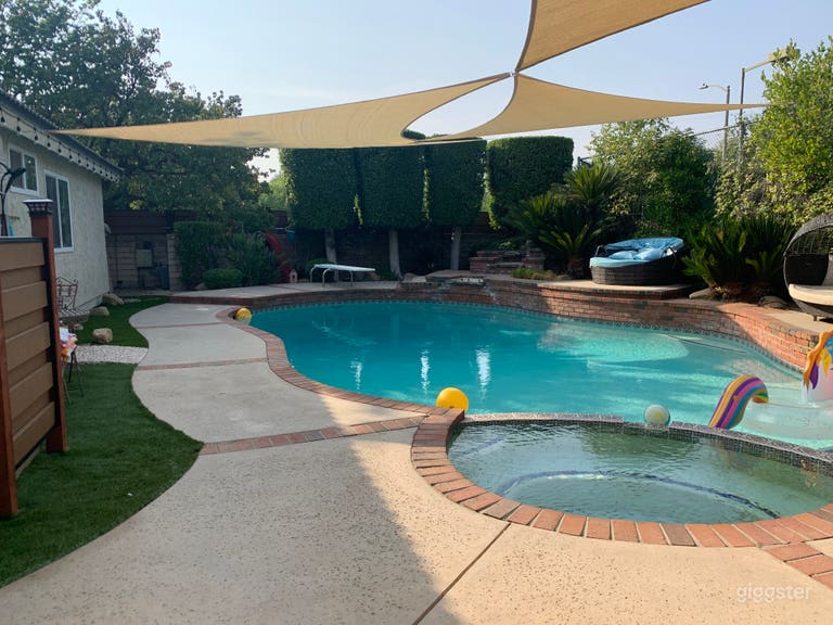  All American  Ranch style home with tennis courts  