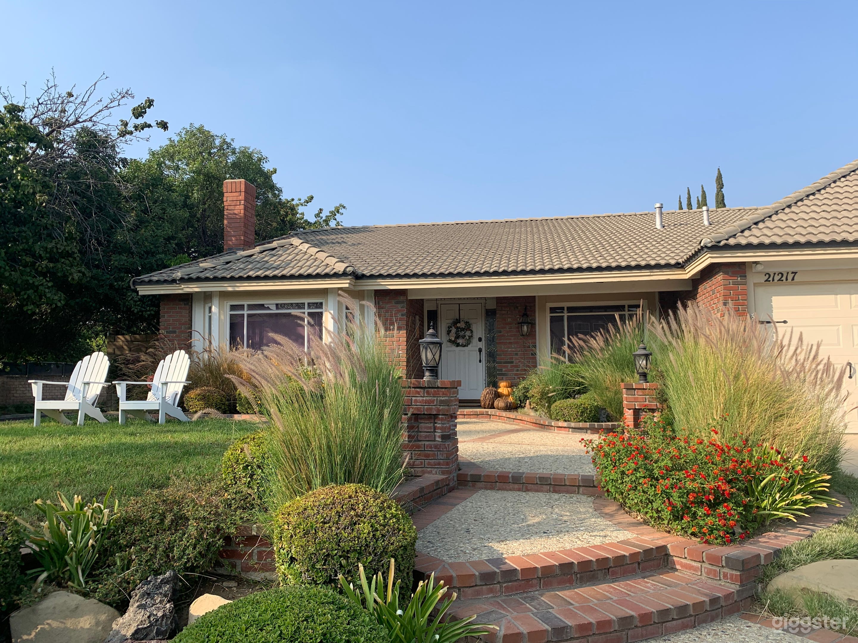 All American  Ranch style home with tennis courts  Photo 1