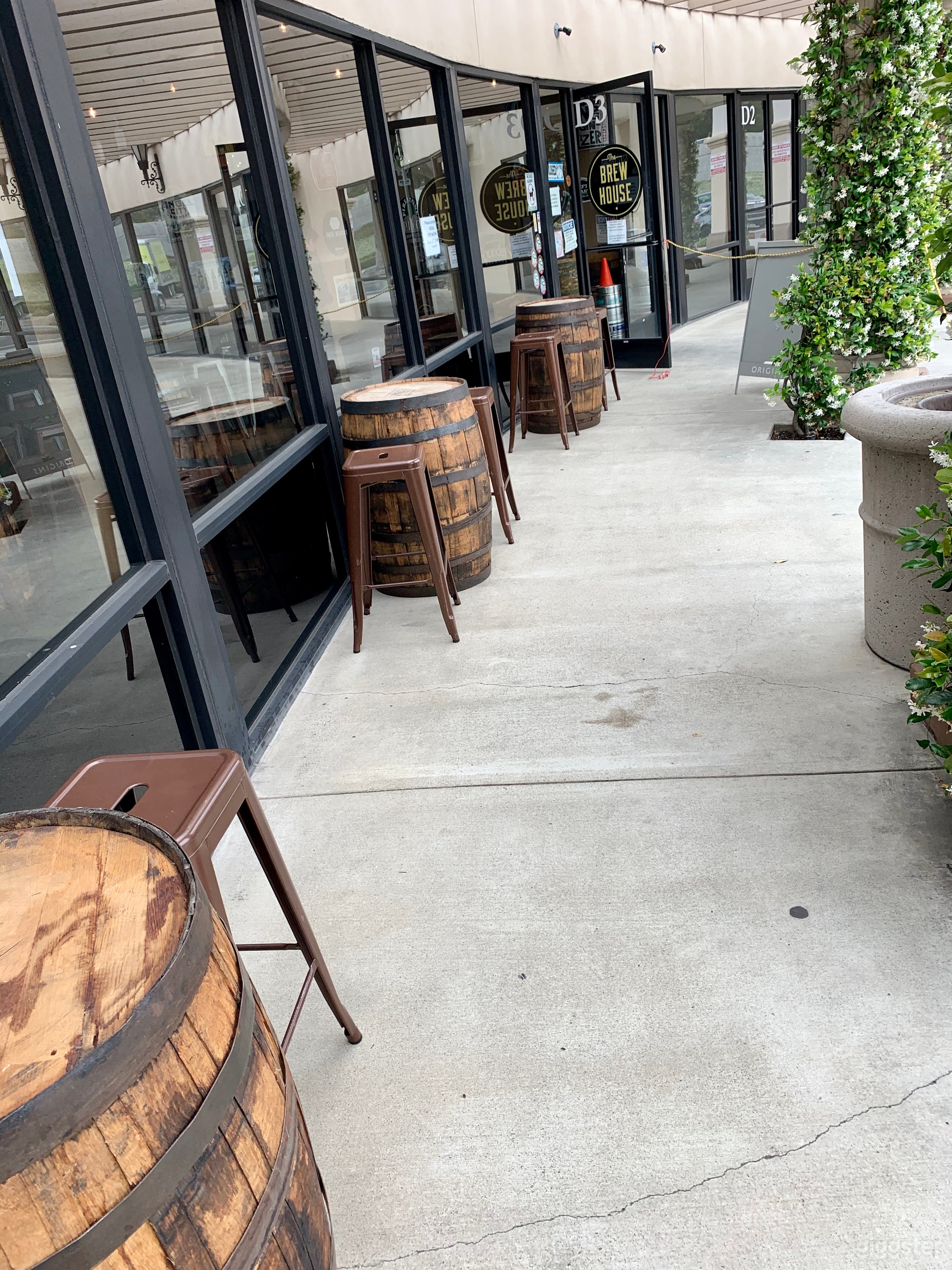 Barrels provide outdoor seating. 