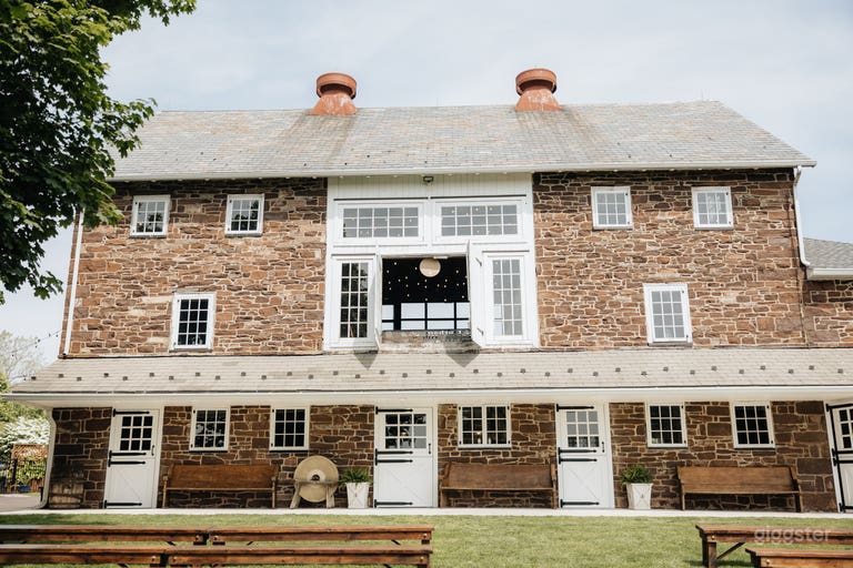  Stone bank barn that overlooks a horse pasture and surrounding fields.  