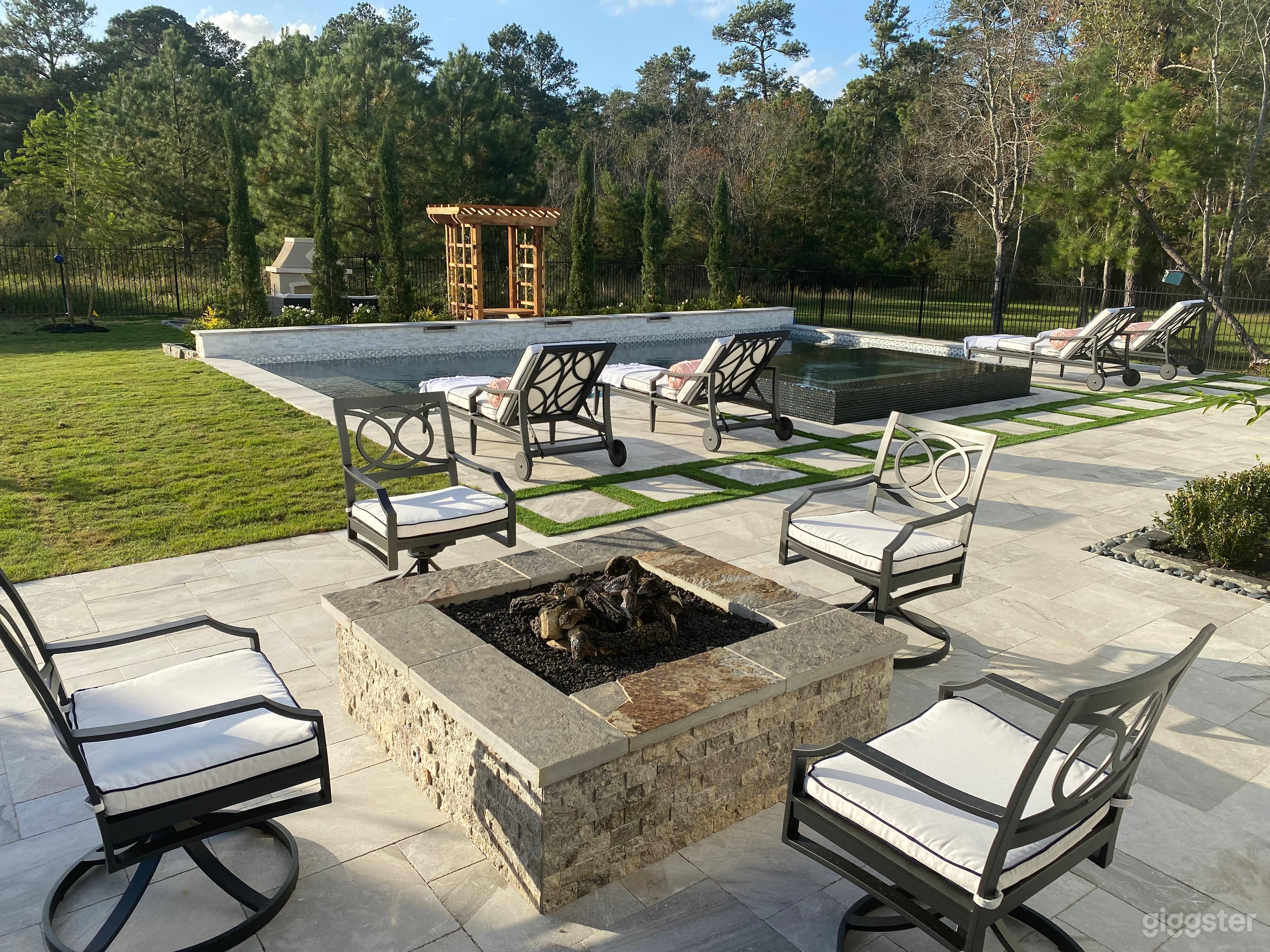 Gas fire pit overlooking pool