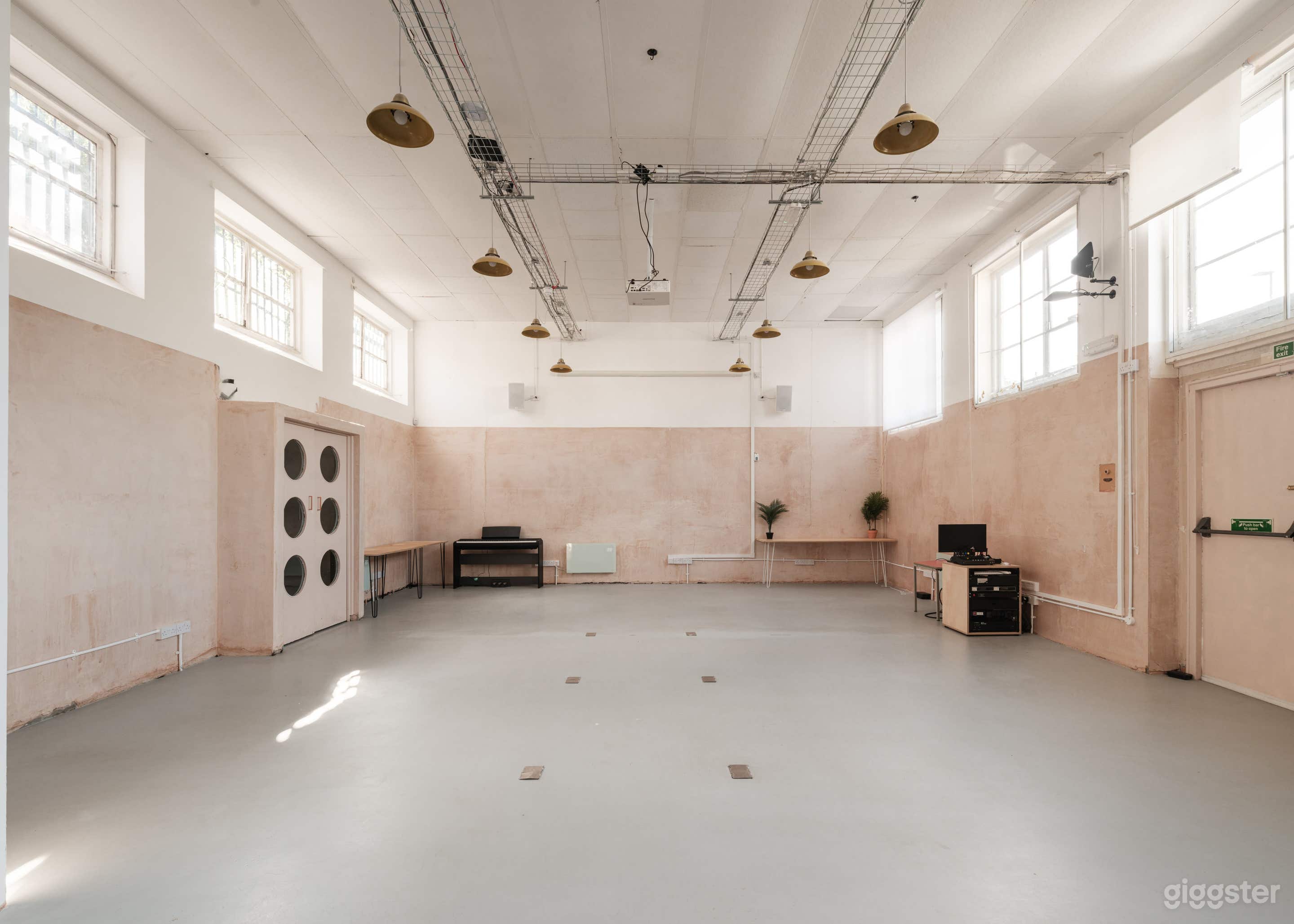 Minimalist, AV-ready Hall for Conferences, Film & Events Photo 2