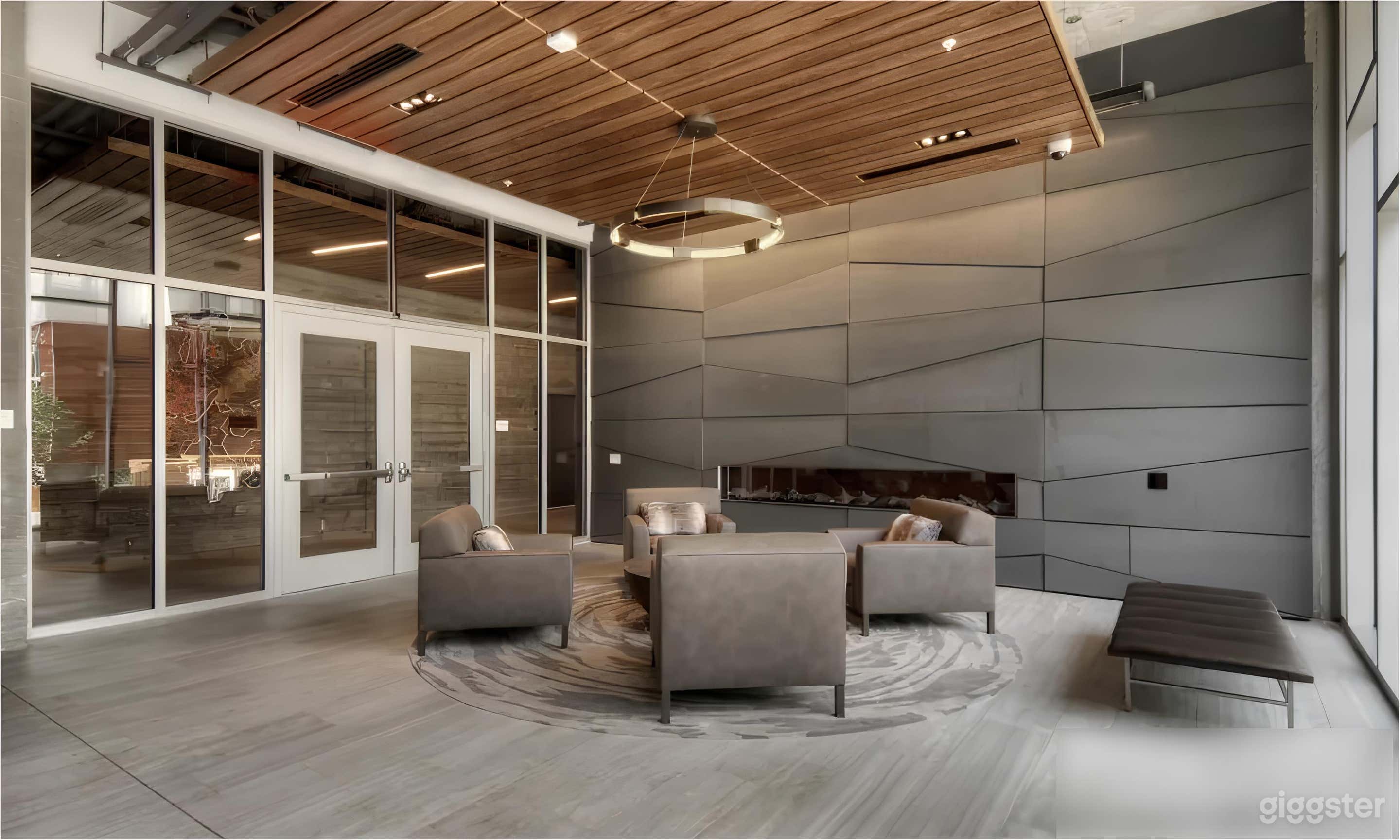 Modern, luxurious lounge with kitchen access Photo 3