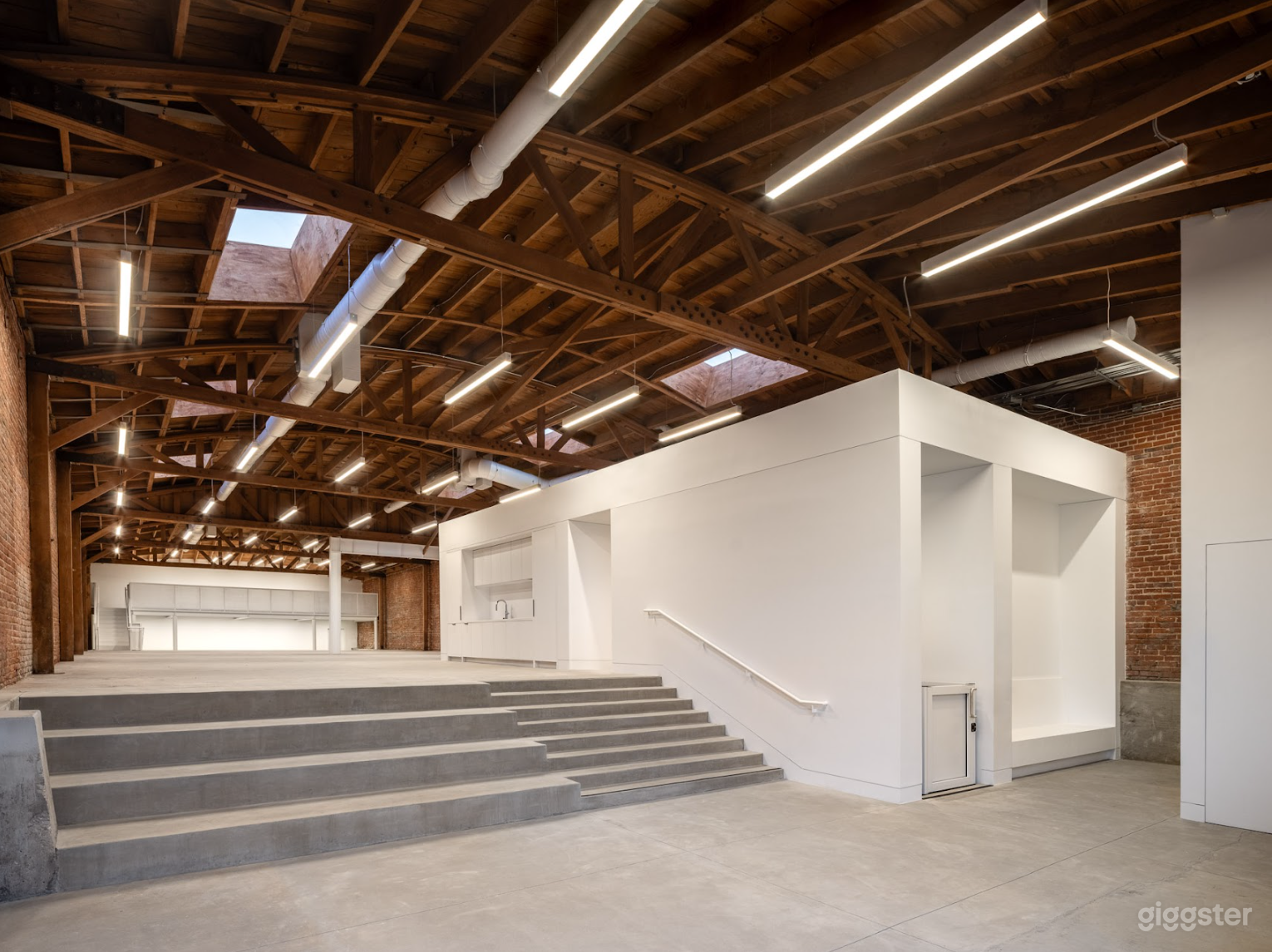 Bow Truss Warehouse, Exposed Brick + Mezzanine Photo 1