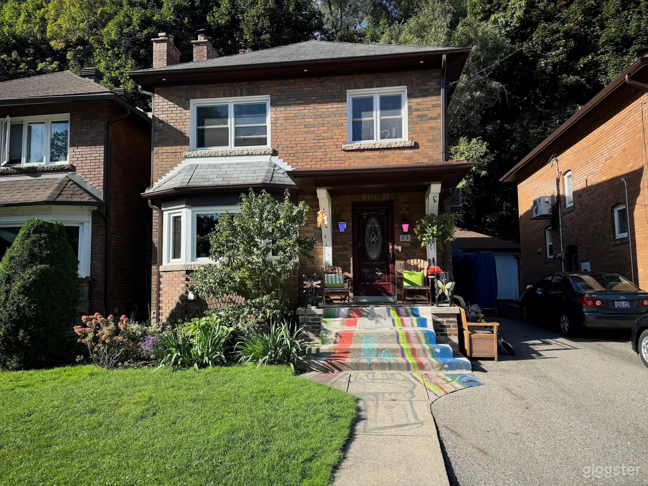 Eclectic &amp; Artsy Red Brick Home with Garden Views Photo 3