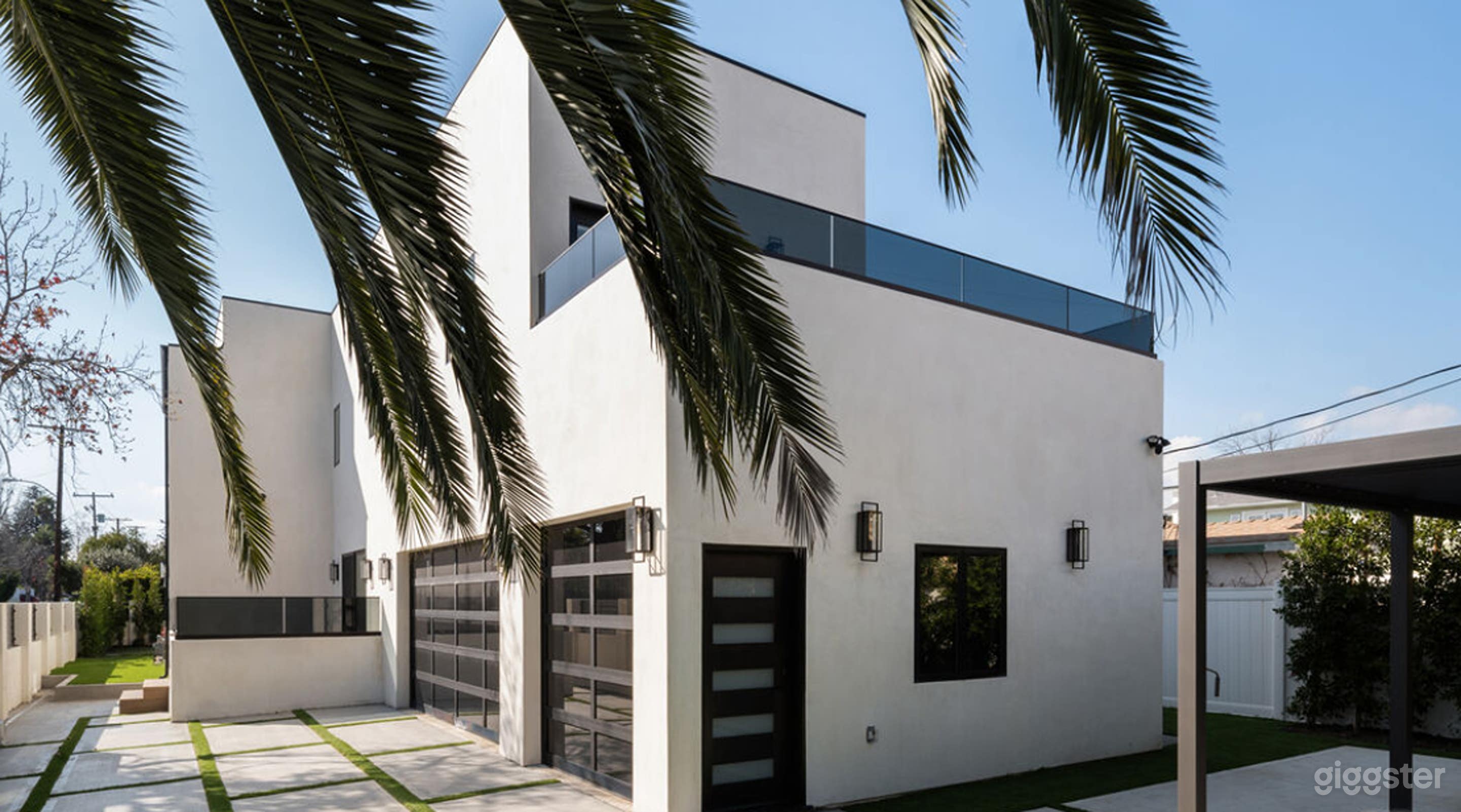 Modern Open-Concept Home with Designer Fireplace & Balcony Photo 2