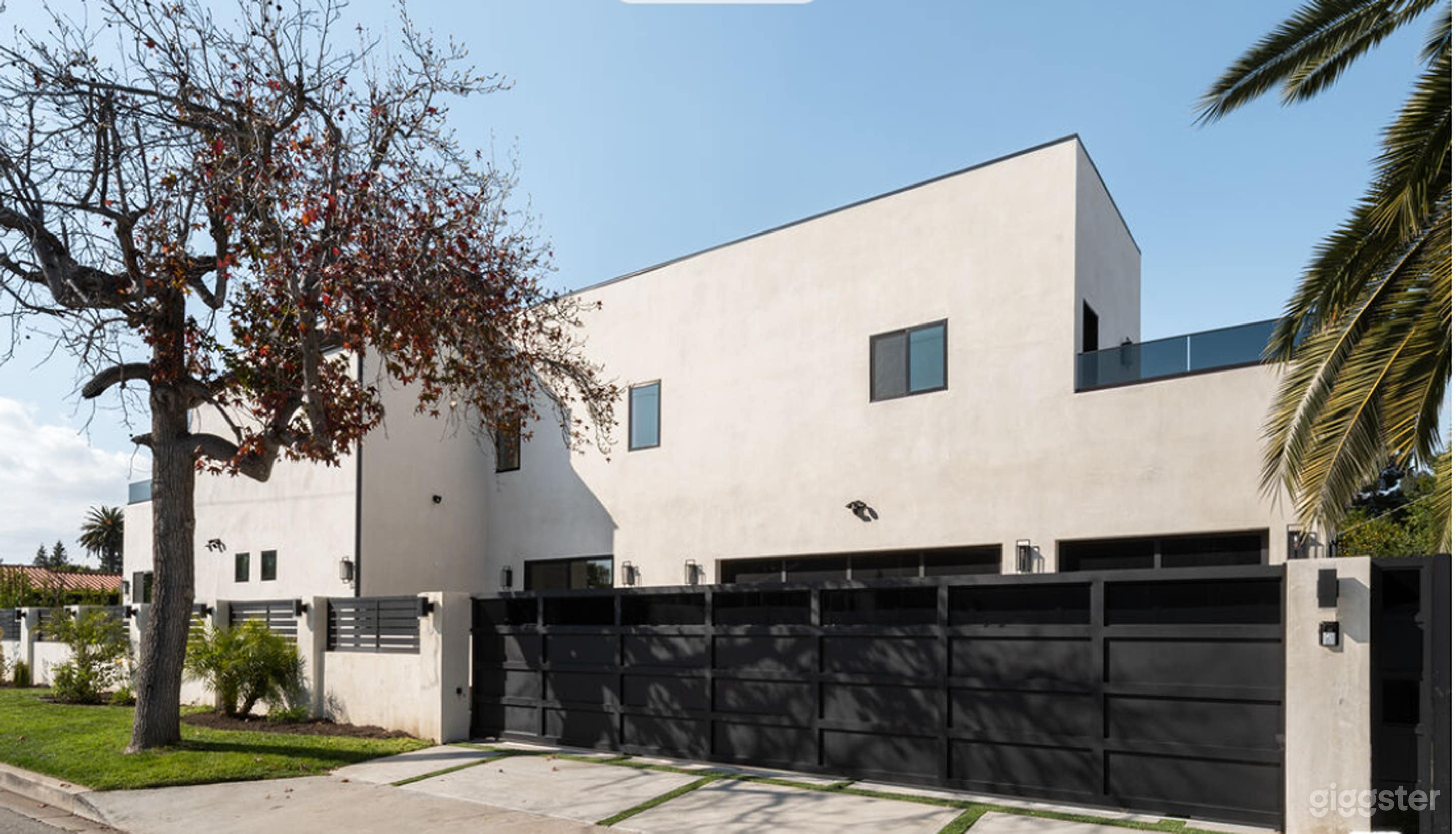 Modern Open-Concept Home with Designer Fireplace & Balcony Photo 4