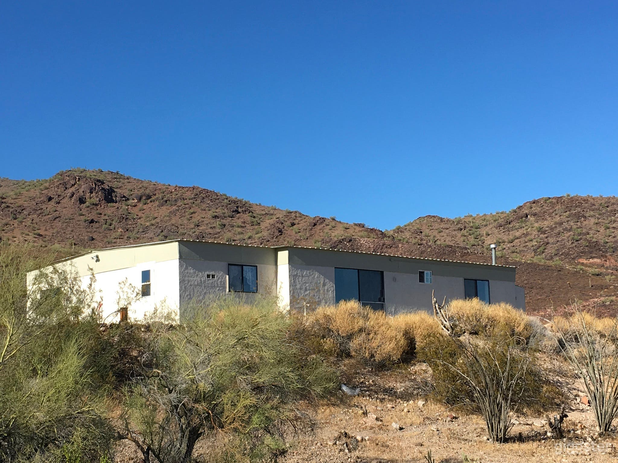 2500 sq foot cinderblock home has been updated with solar and restored 