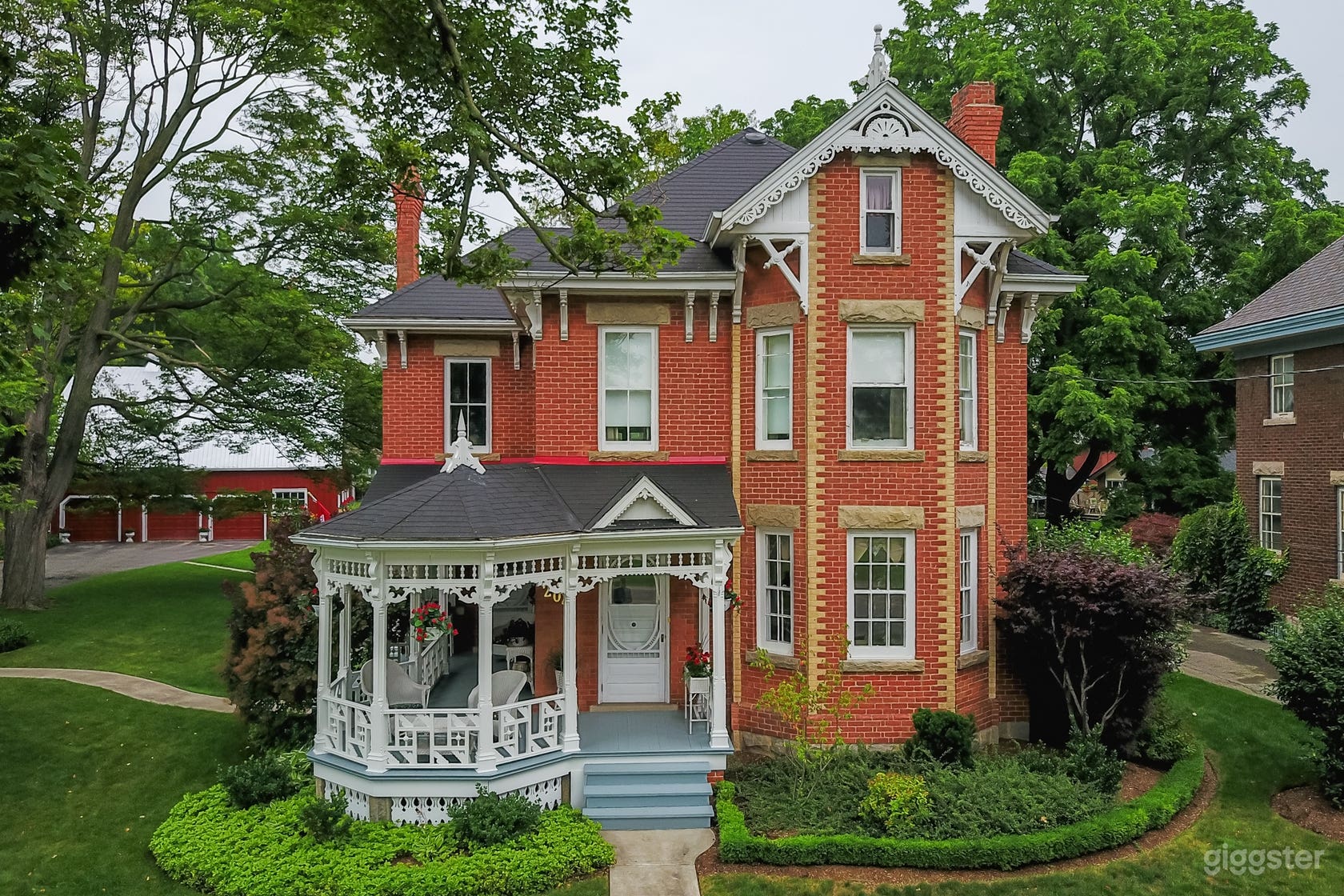 Beautiful, Victorian home with red hip barn Photo 1