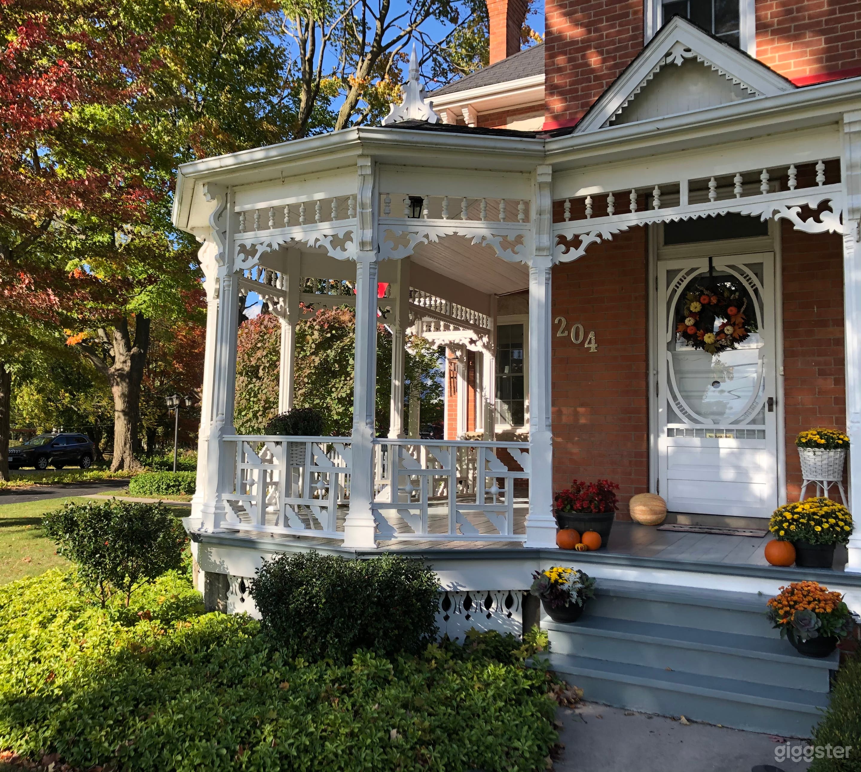 Beautiful, Victorian home with red hip barn Photo 3