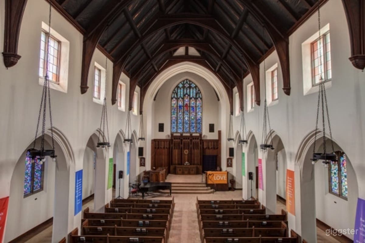 Classic Church with Stained Glass Windows Photo 1