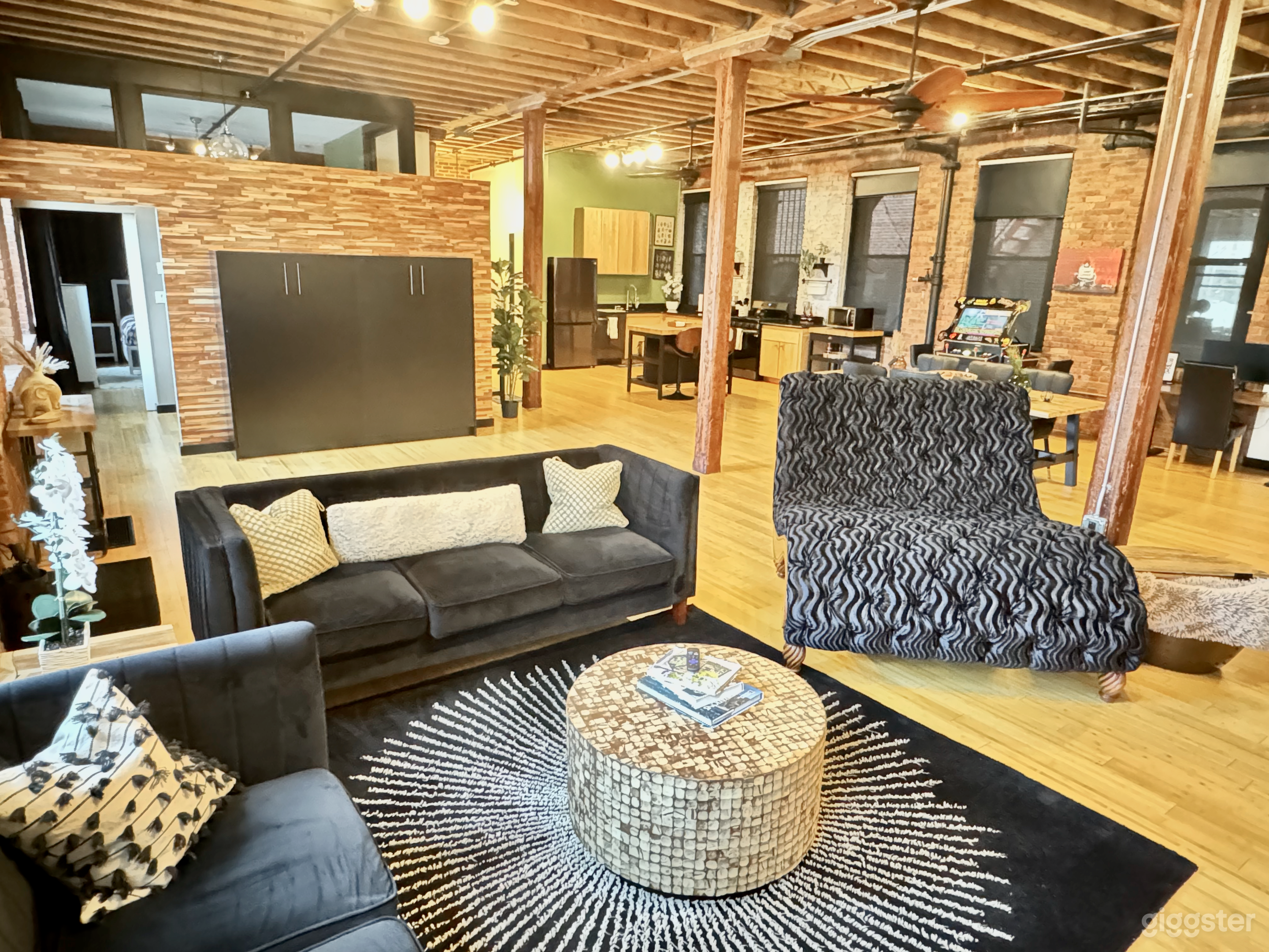 Industrial Film Loft with Brick and Massive Windows Photo 1