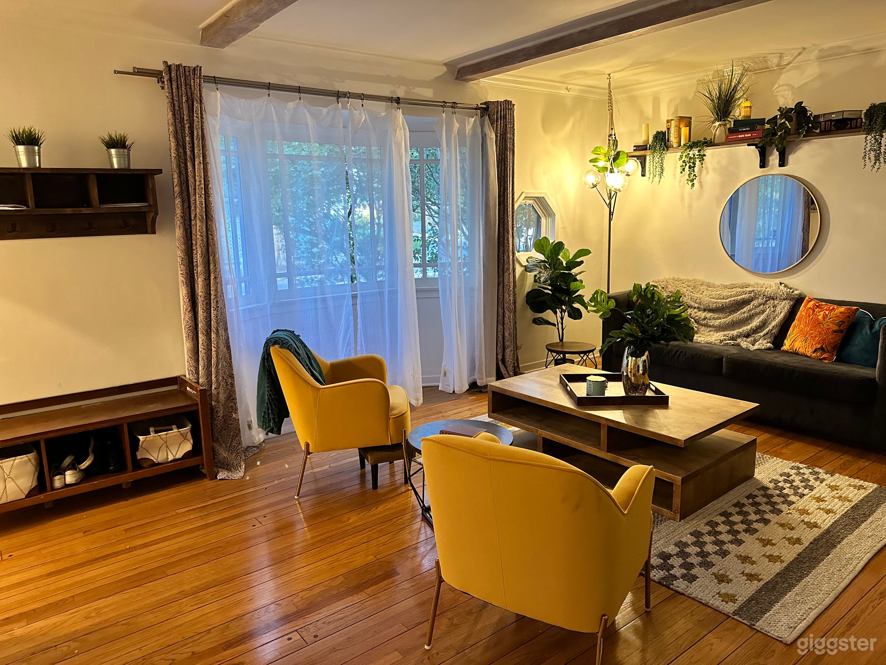 A beautiful bay window facing the street lets a lot of natural light in.