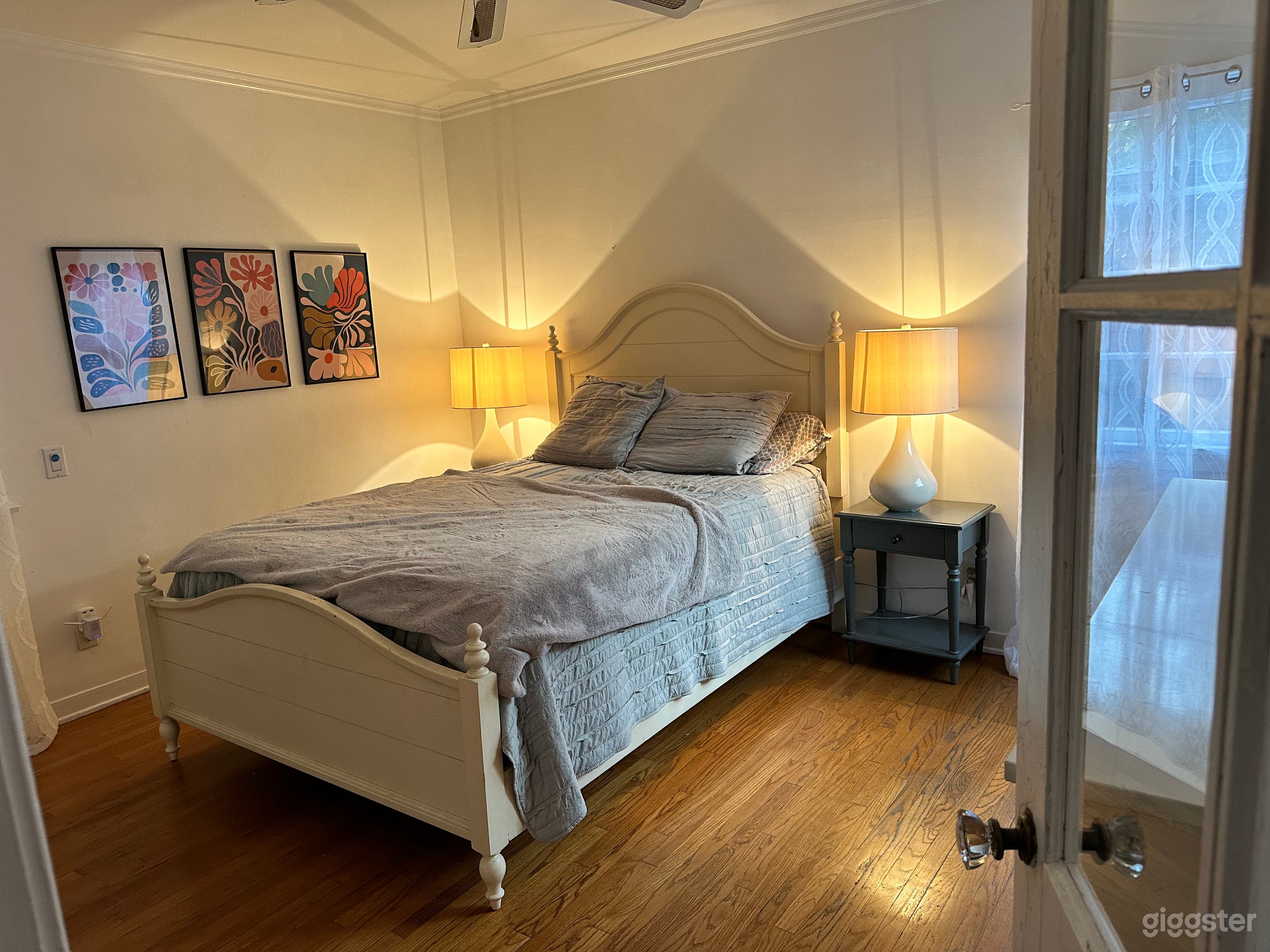 The second bedroom has a queen sized bed and has a door that exits to the backyard.