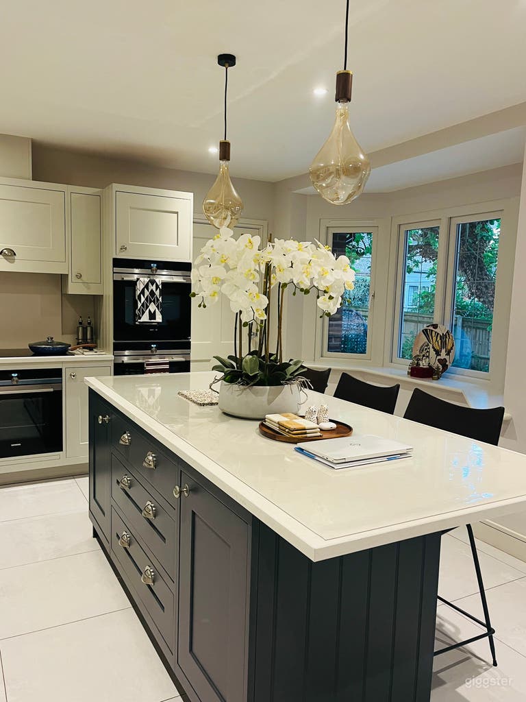  Windows in the kitchen area overlooking the garden, with access to utility room in the rear 