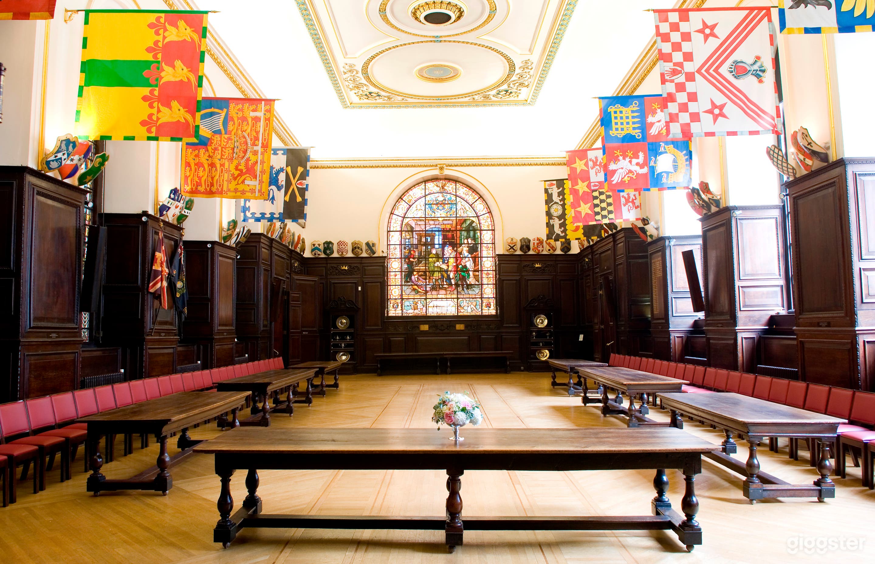 16th Centaury wood-panelled dining room with ornate ceiling 