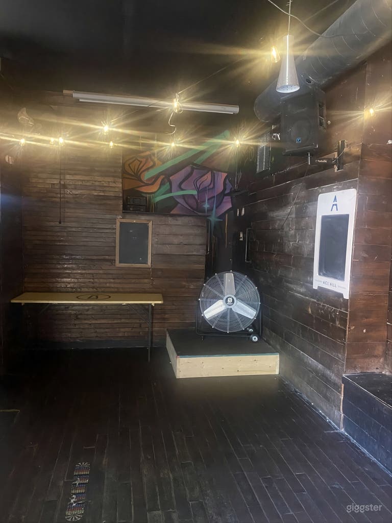  Versatile Brick-Wall Bar & Patio Event Space with Umbrellas 