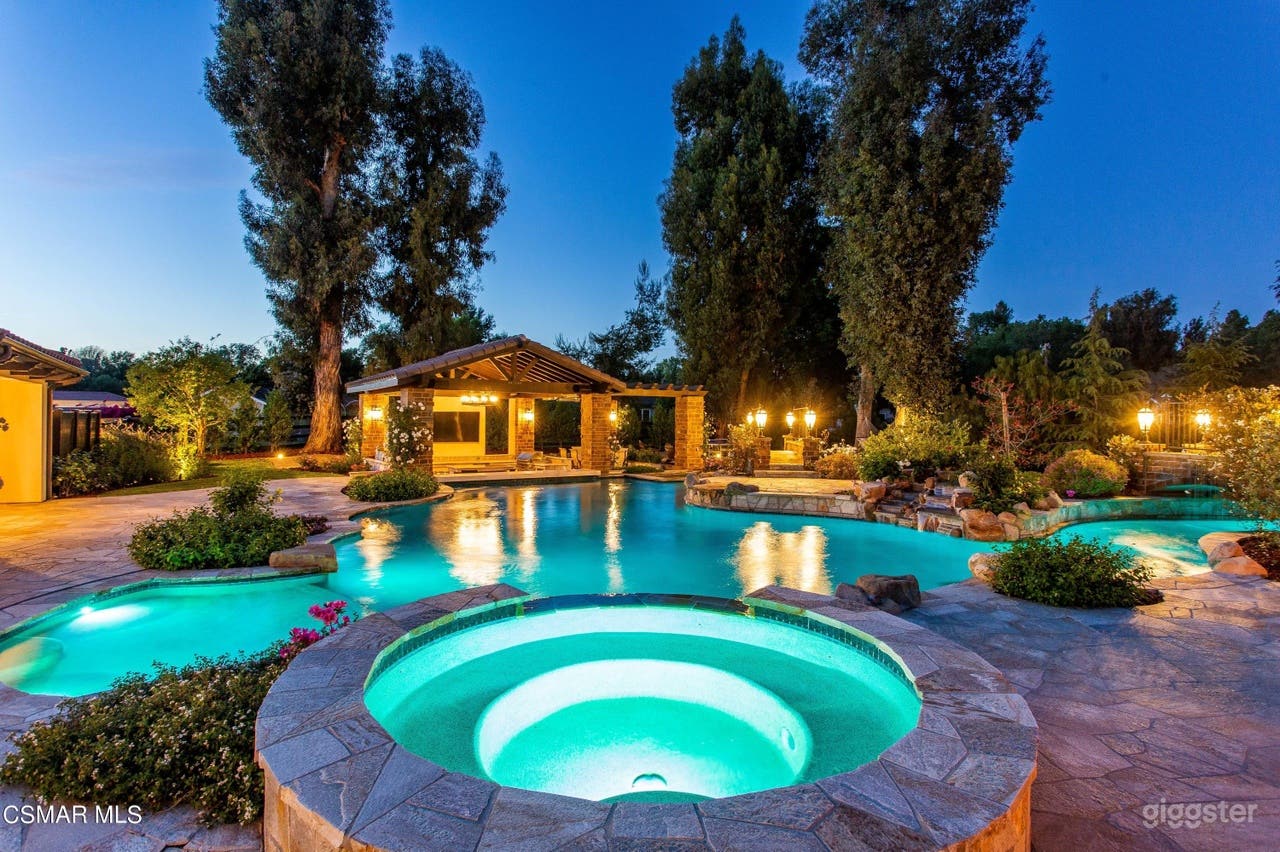 STUNNING estate with a resort oasis!! Photo 1