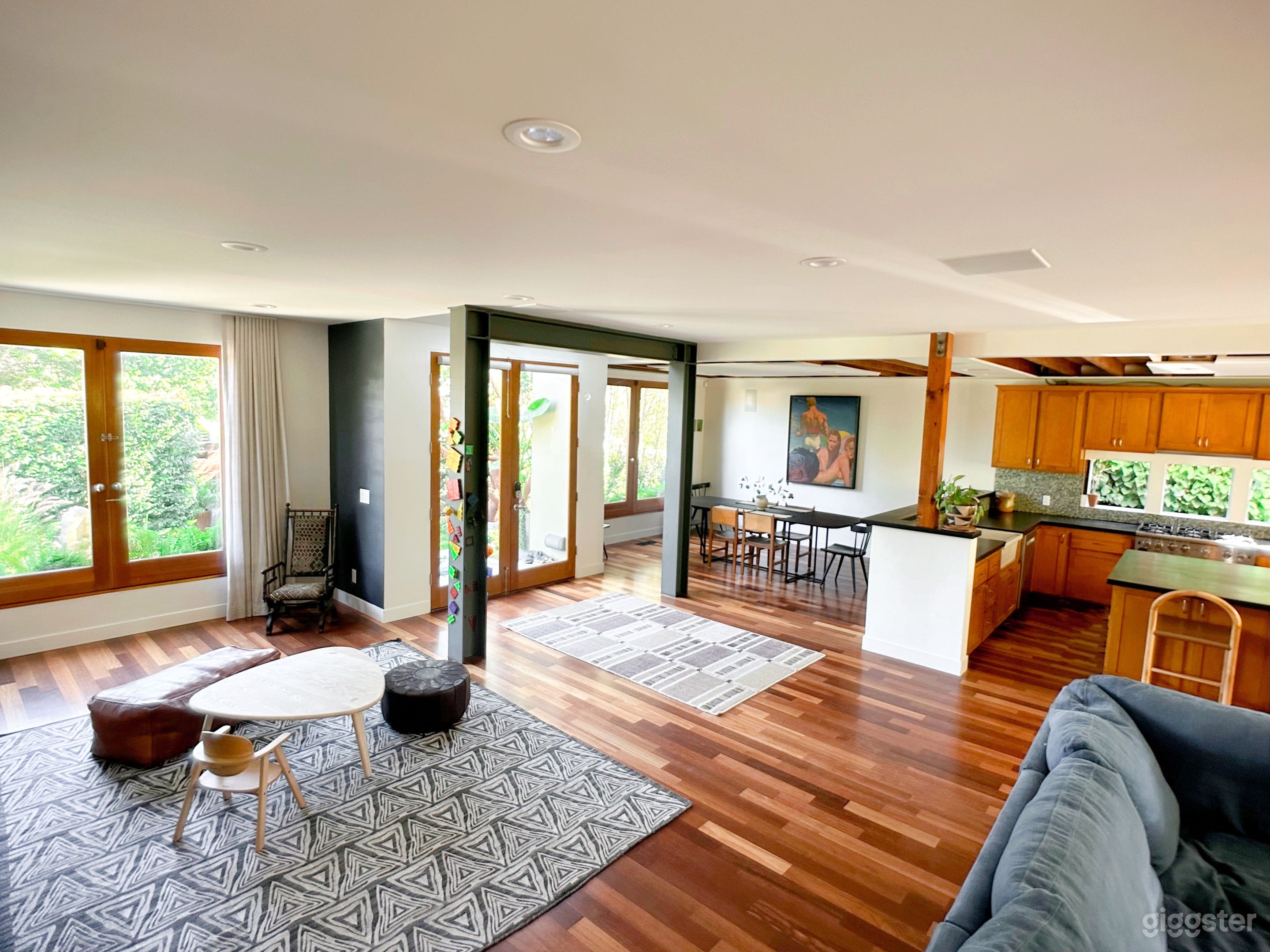 Open concept kitchen, dining, living space.