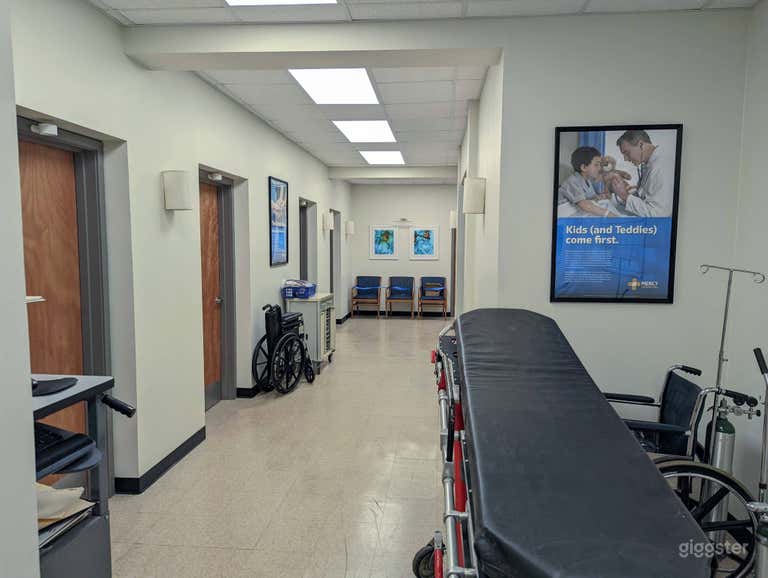  Hospital main hallway. Filled with real hospital stretchers, wheelchairs, medical stations, and medical equipment. The hospital set is LARGE. It has 3 rooms, 5 hallways, many doors, a Nurse&#x27;s Station and much more! 