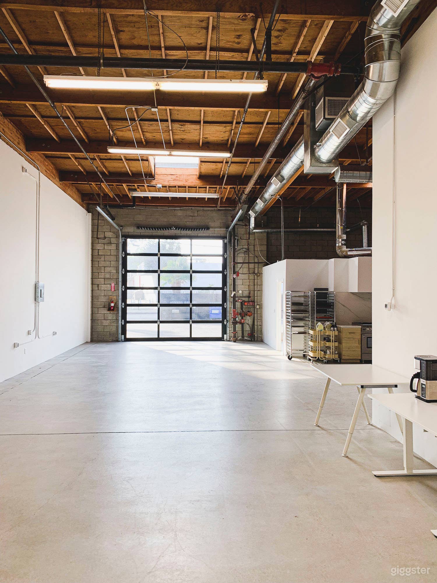 Rollup door access to street level gated parking lot 

10 Parking Spots in gated lot (additional parking available for rent + free street parking when available)

Rollup door doubles as 12’ bank of North facing windows