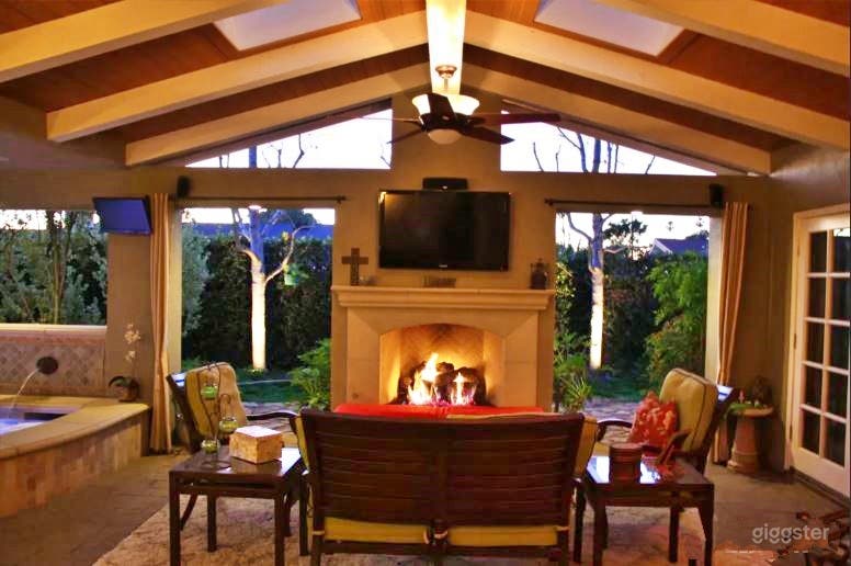 Relaxing Hot Tub Area with Fireplace Photo 4