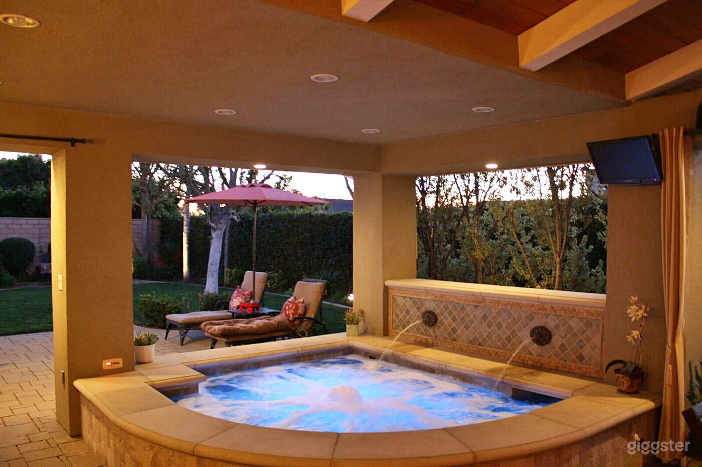 Relaxing Hot Tub Area with Fireplace Photo 1