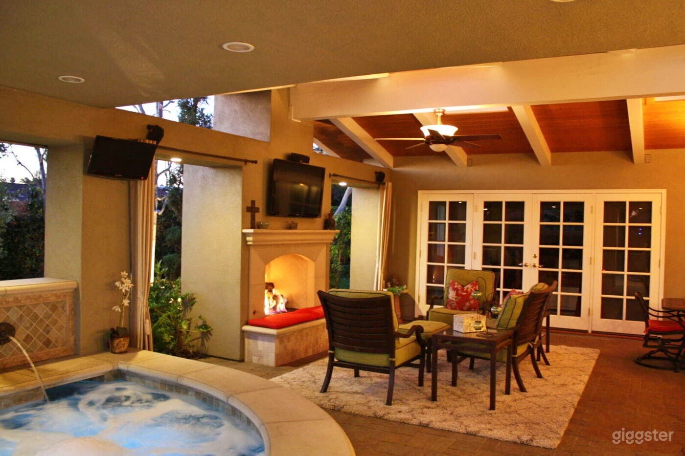 Relaxing Hot Tub Area with Fireplace Photo 3