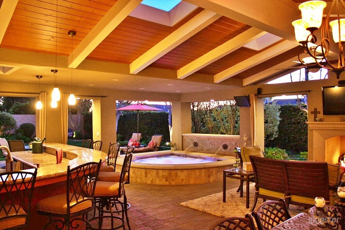 Relaxing Hot Tub Area with Fireplace Photo 2