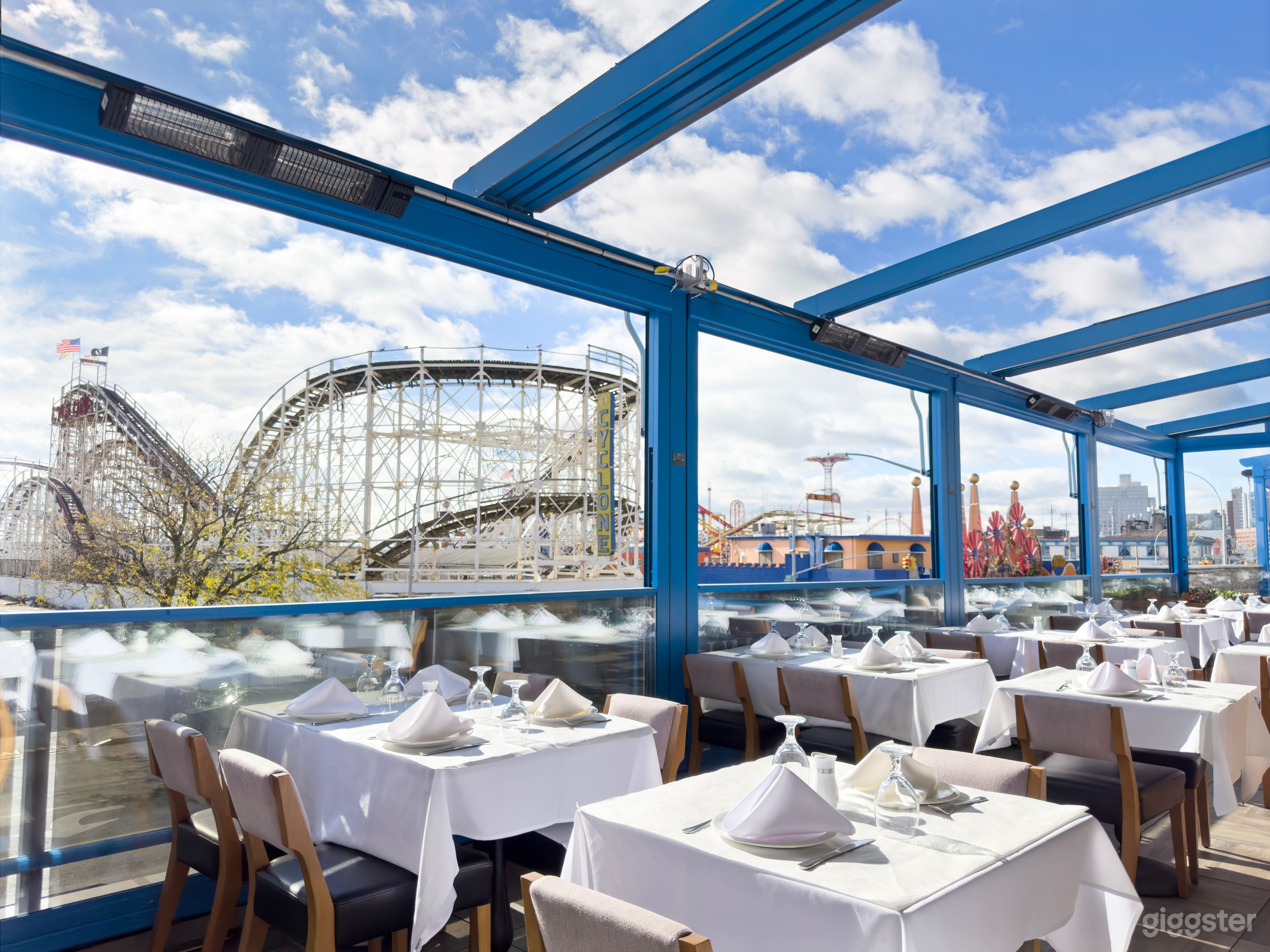Our featured terrace with views of Coney Island, the Ferris Wheel, and the iconic Cyclone. Varying on season, in the evenings the view is lit up from Coney Island's Neon Lights.

This space can seat 60 guests comfortably.