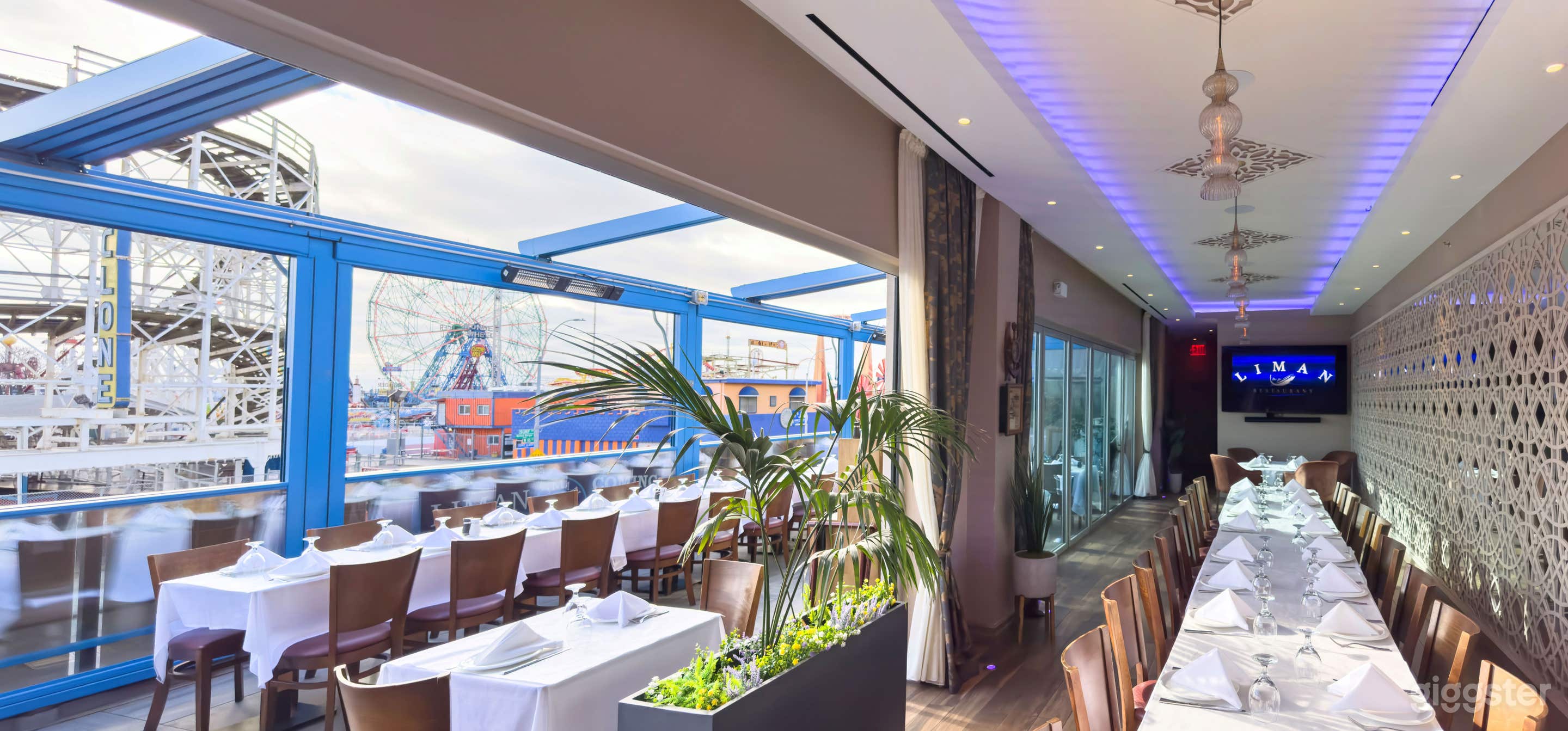 Our private dining room and terrace, windows can be open or closed. Awnings can be open or closed. Together, 100 person capacity.