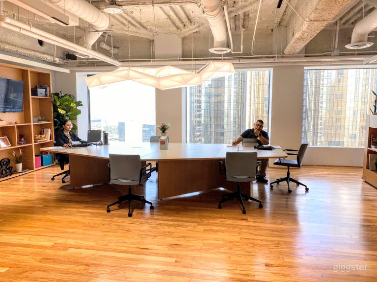  18th Floor: COMMON AREA, Open Conference Table, view from the front entrance upon arrival to reception area 